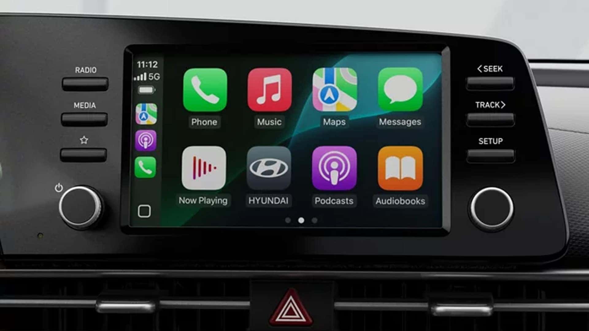 Hyundai Elantra infotainment touchscreen displaying Apple CarPlay icons including navigation, music, phone, messages, and podcasts