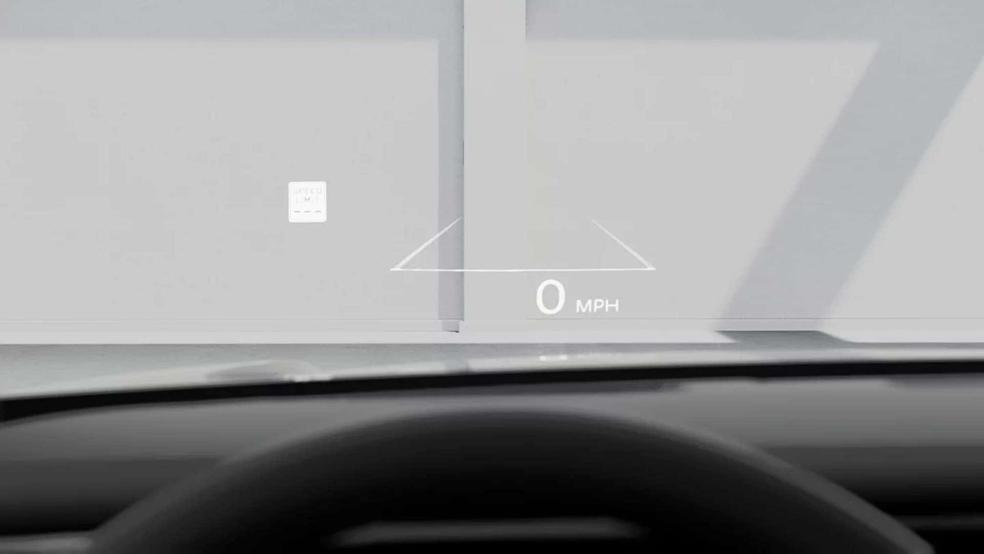 Wide interior view of the 2026 Hyundai Palisade Hybrid highlighting digital gauges, infotainment screen, and premium cabin technology