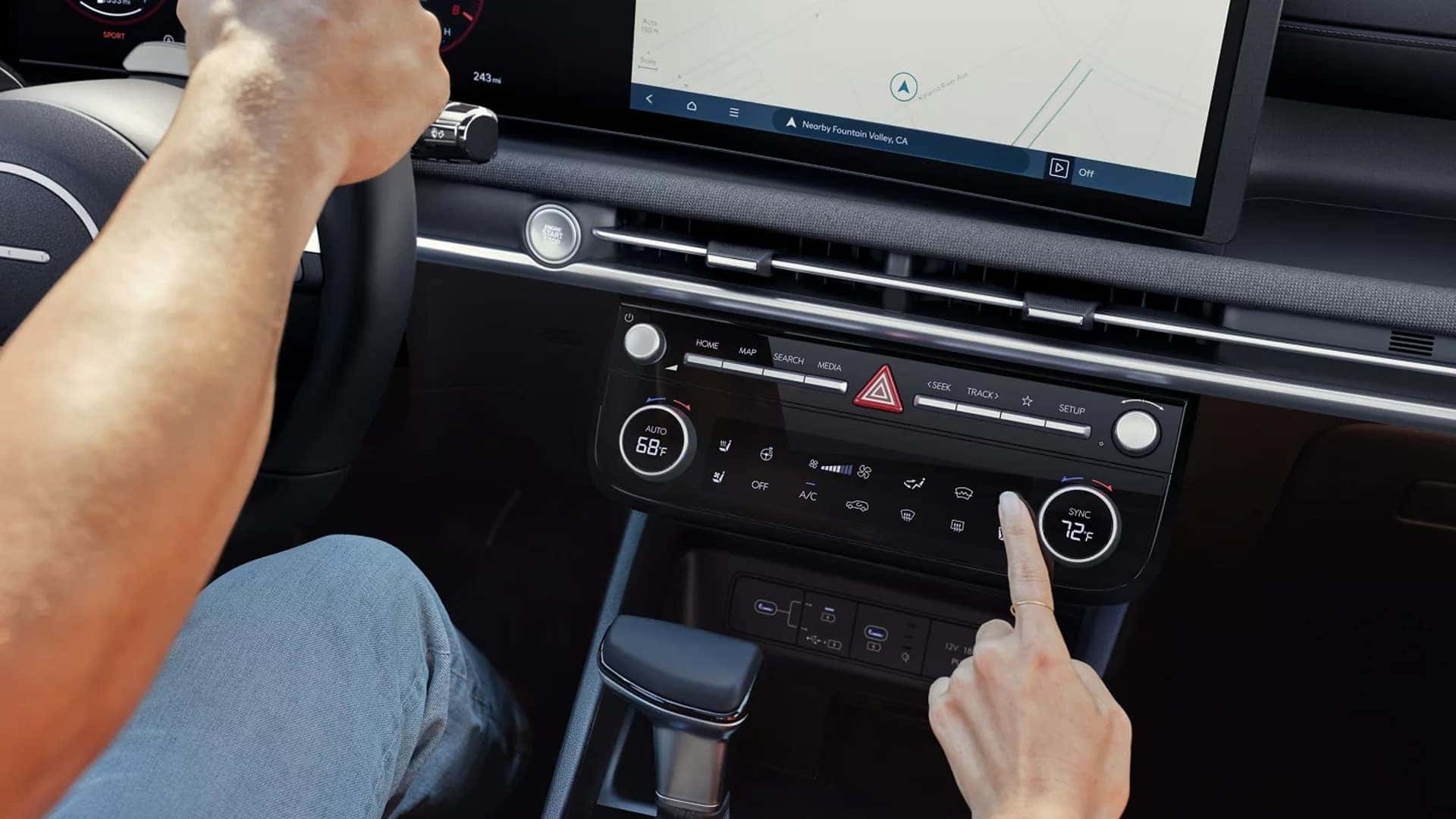 Close-up of the 2026 Hyundai Santa Cruz center console and climate controls, emphasizing interior comfort and convenience features