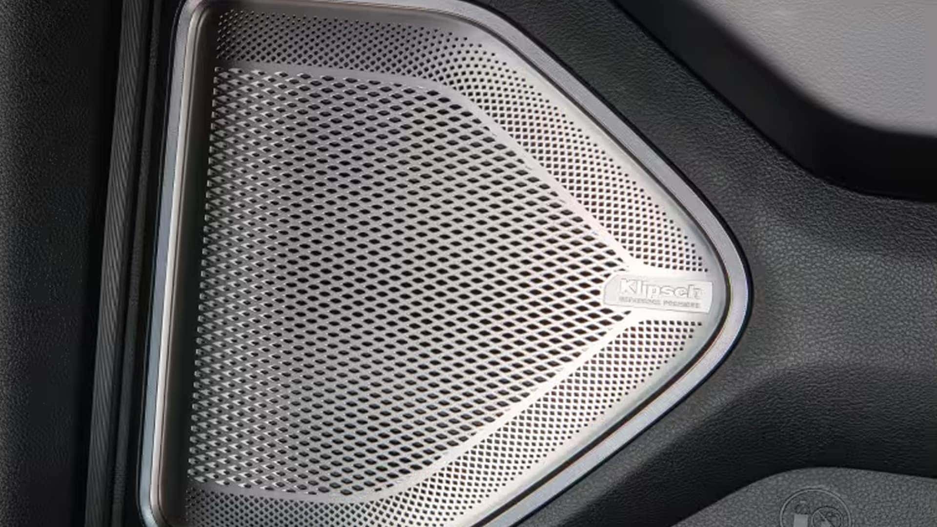 Close-up of a 2026 Ram 1500 interior speaker grille showing Klipsch premium audio system branding