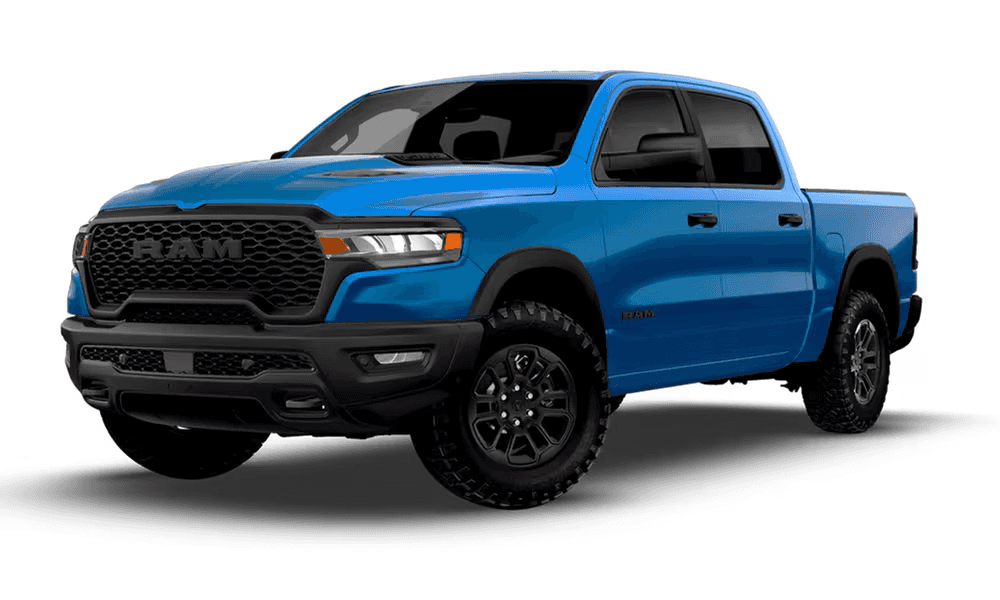2026 Ram 1500 Rebel pickup truck in blue with off-road tires, front three-quarter exterior view