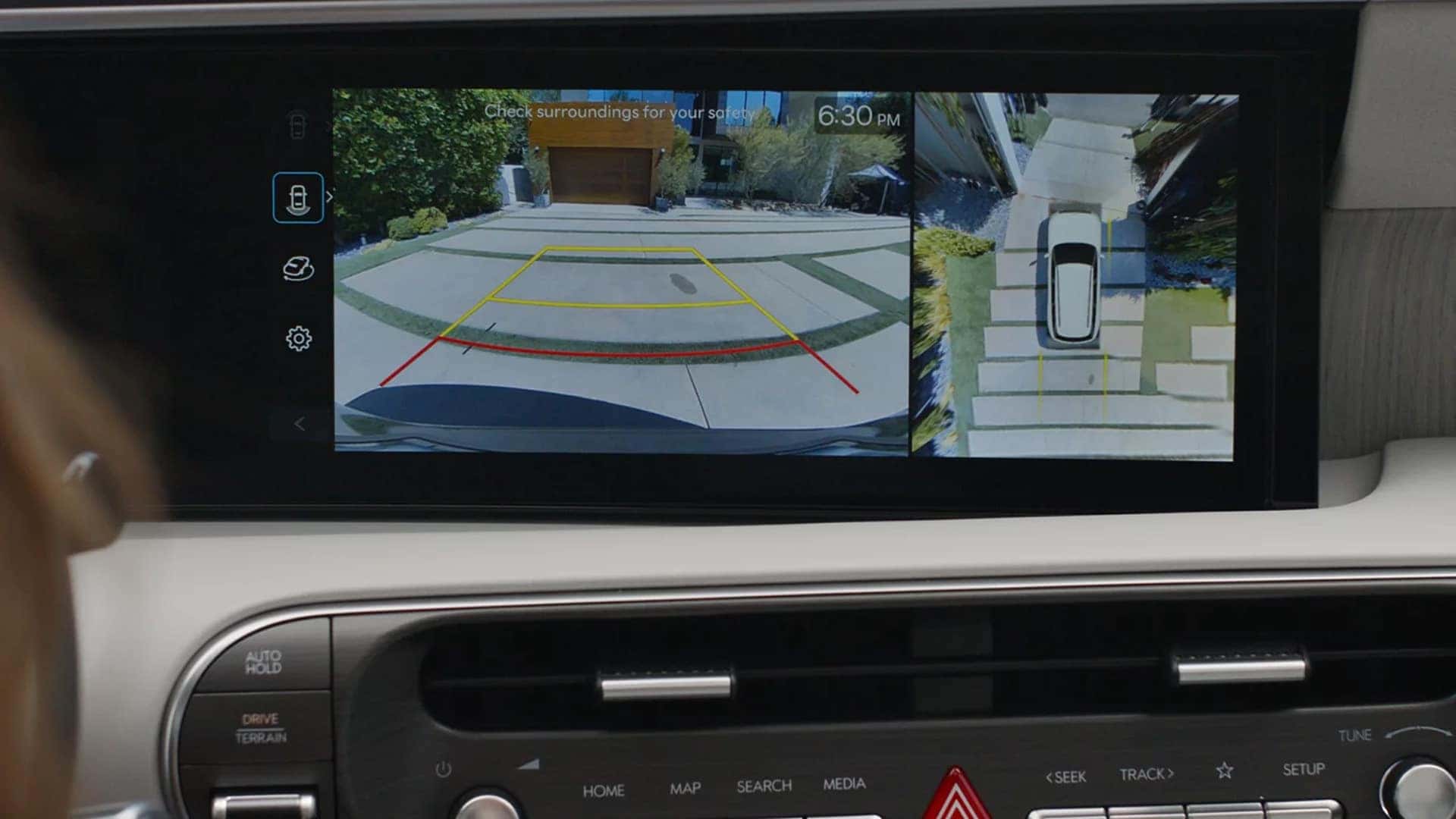 2026 Hyundai Palisade Hybrid touchscreen displaying surround view camera system and parking assistance technology