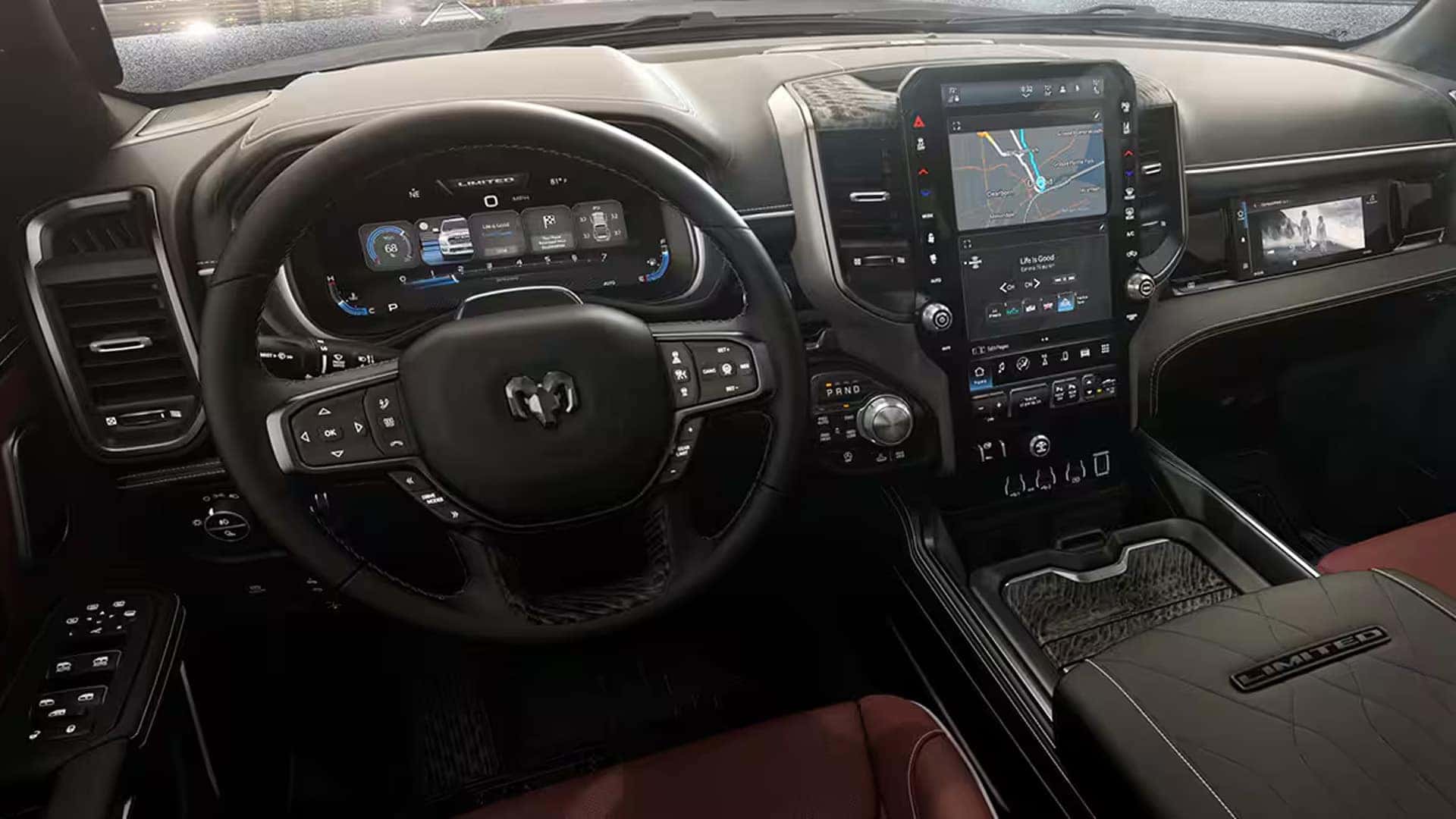 Front passenger display in the 2026 Ram 1500 showing media playback controls and infotainment content integrated into the dashboard