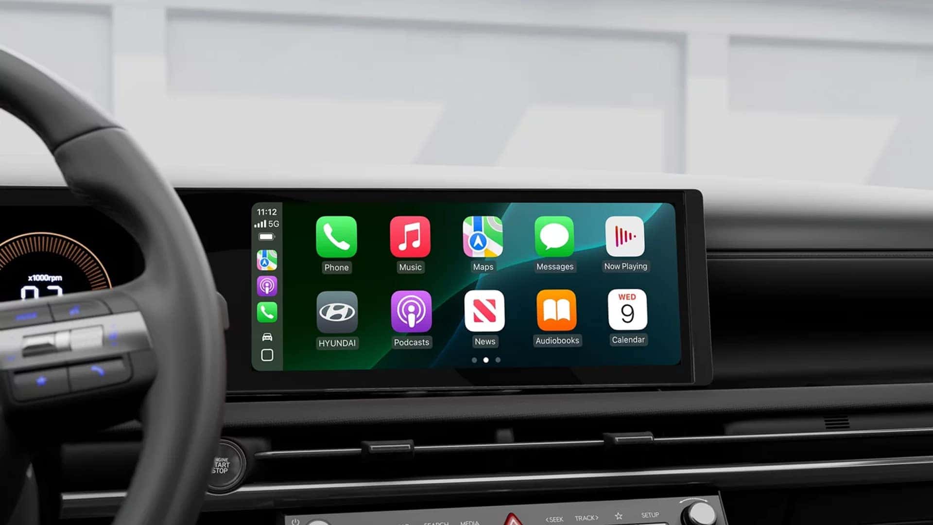 Close up of the 2026 Hyundai Santa Cruz infotainment display with Apple CarPlay interface and connected app icons visible