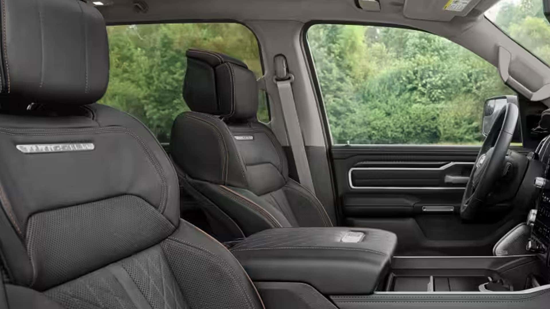 2026 Ram 1500 premium interior with leather seats, contrast stitching, and upscale trim details across the cabin
