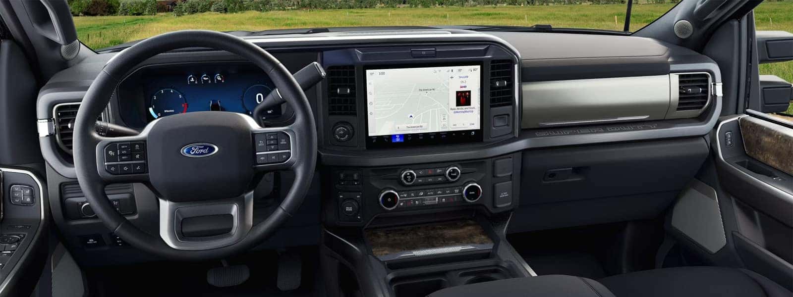Interior of 2026 Ford F-250 Super Duty showing SYNC 4 touchscreen, digital instrument cluster, and steering wheel controls