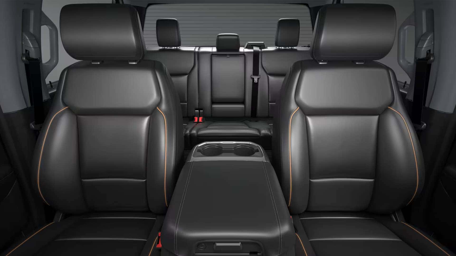 Front and rear seating layout inside the 2026 Ford F-250 Super Duty Crew Cab with wide center console and spacious second row
