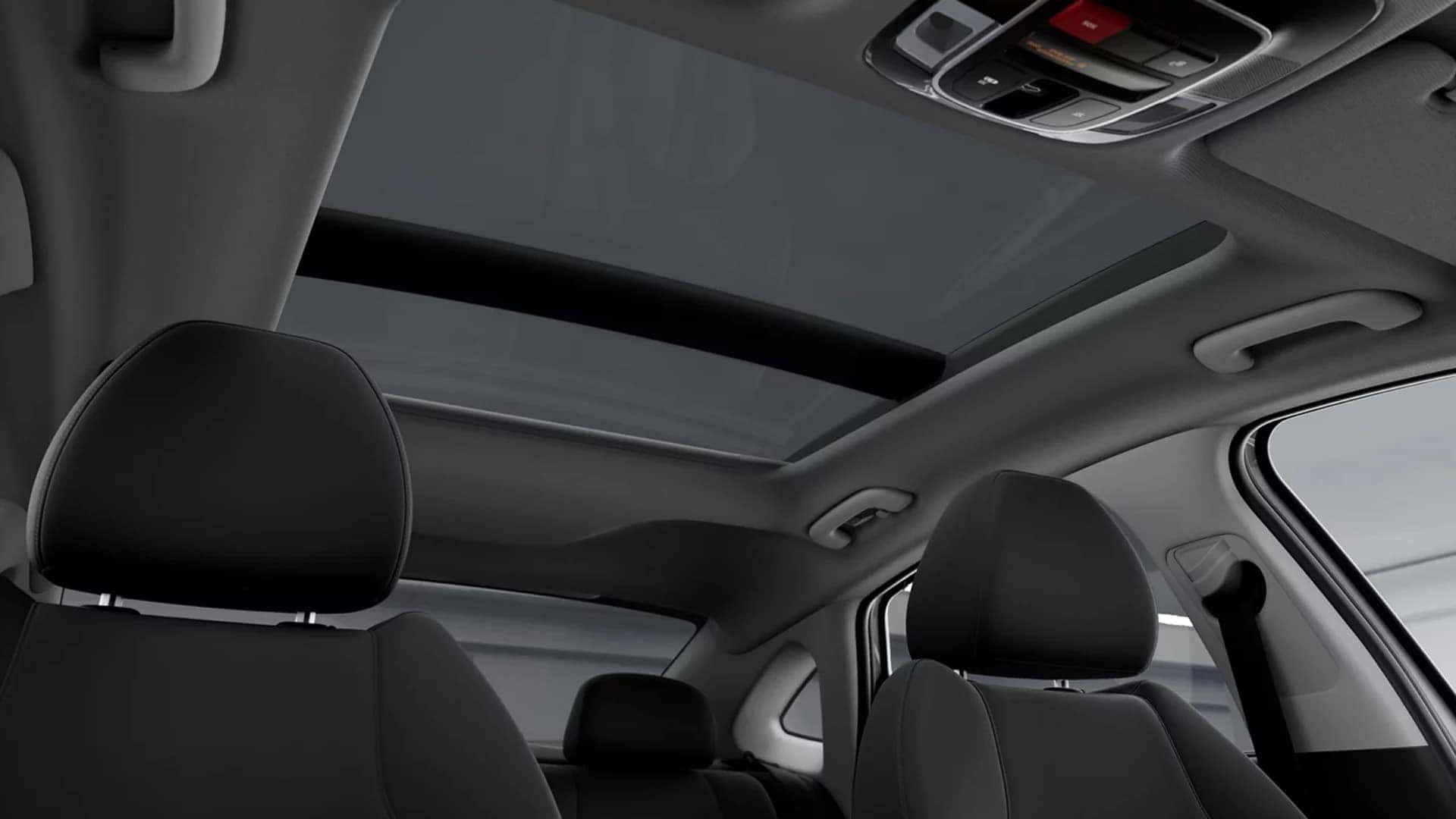 Panoramic sunroof inside the 2026 Hyundai Sonata Hybrid showing overhead controls and natural light across the front and rear seats