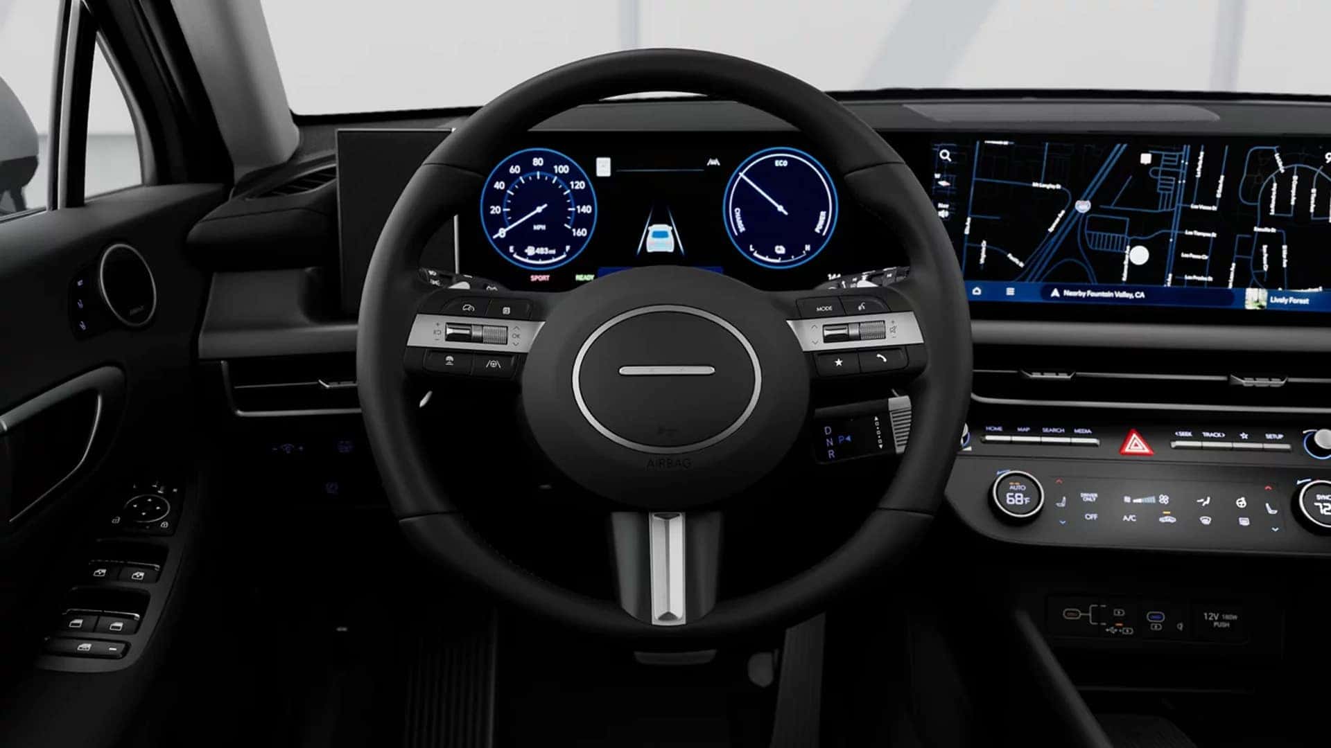 Interior of the 2026 Hyundai Sonata Hybrid featuring wide digital driver display, large touchscreen infotainment system, and steering wheel mounted controls