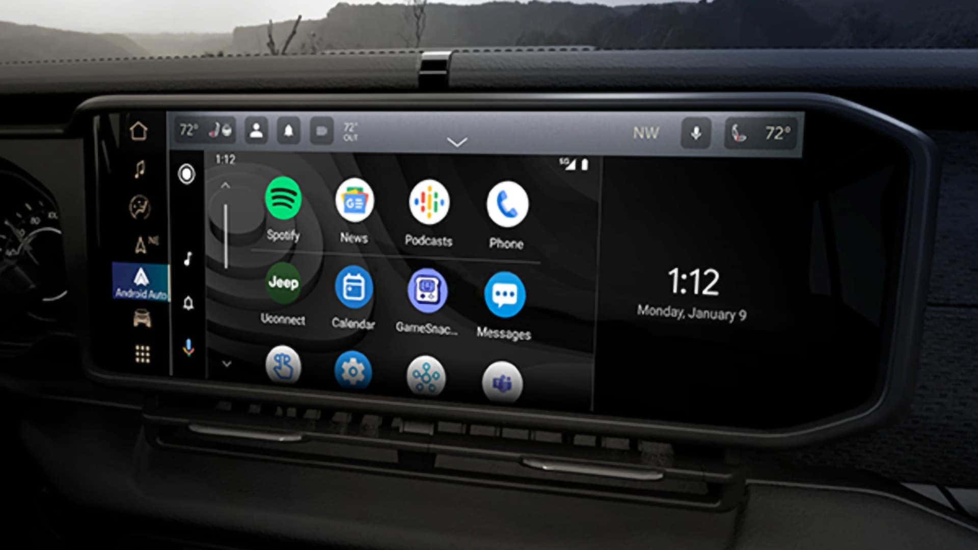 Close up of the 2026 Jeep Wrangler Uconnect 5 touchscreen showing smartphone apps, navigation menu, and multimedia controls