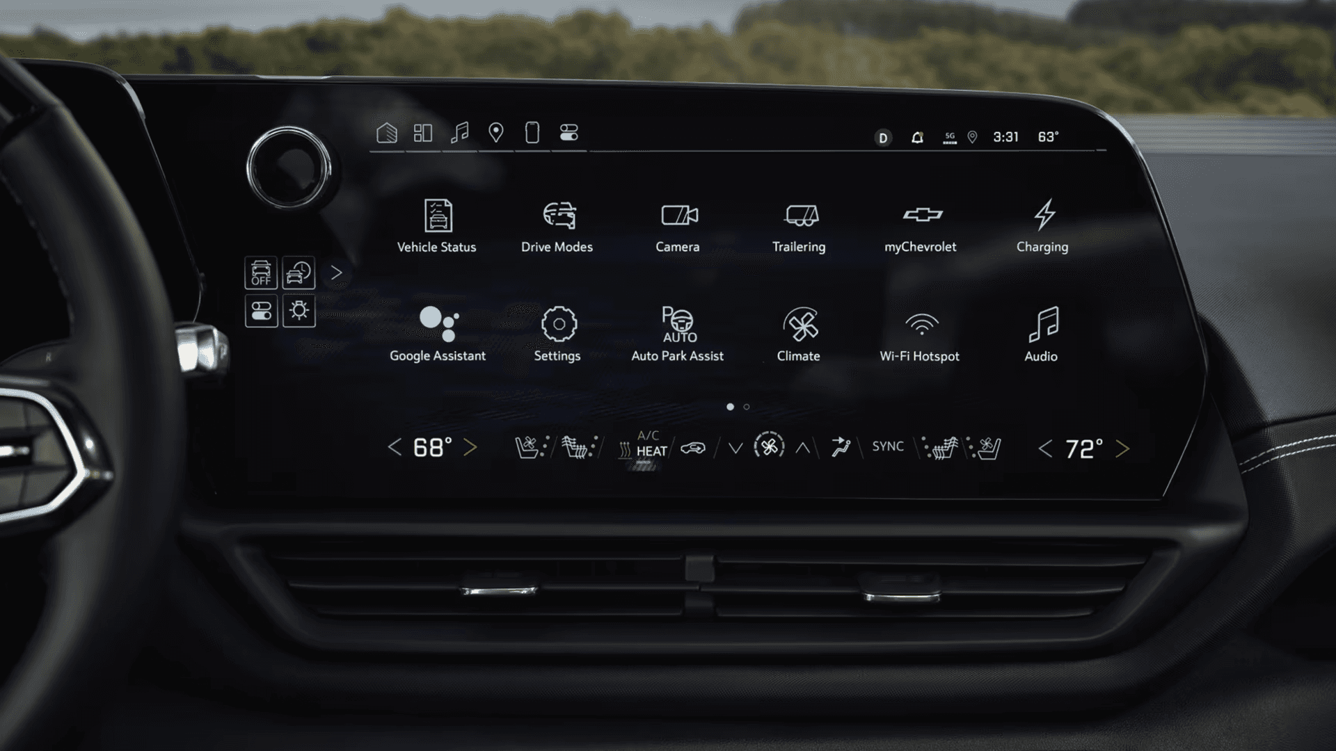 Close up of Silverado EV center screen showing apps for drive modes, camera, trailering, and charging