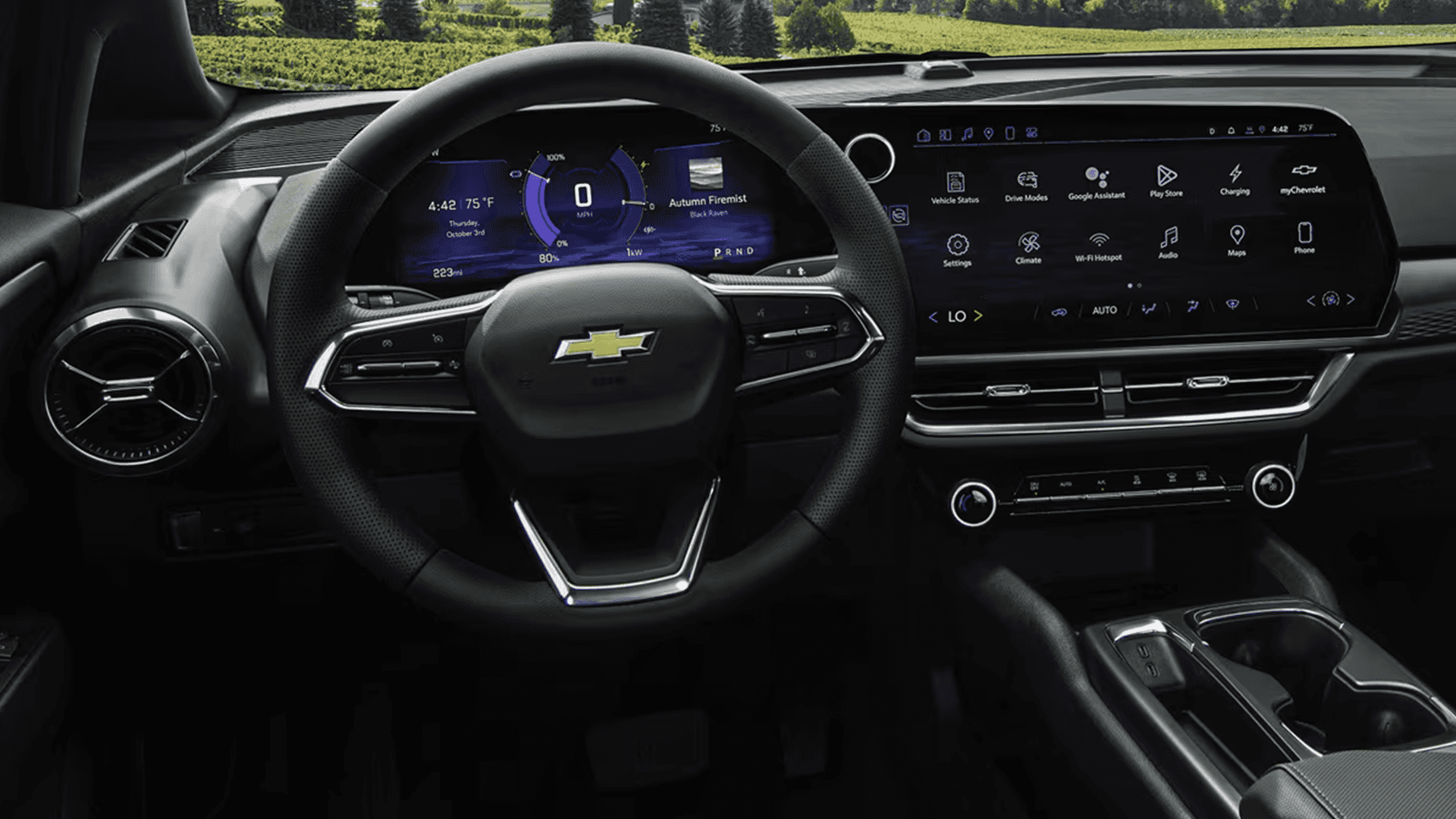 Driver cockpit showing steering wheel, digital gauge cluster, and wide infotainment screen in 2026 Equinox EV