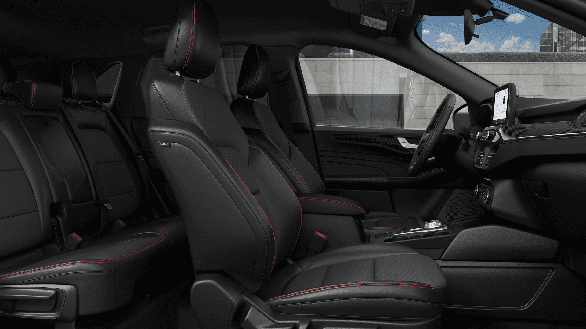 2026 Ford Escape cabin with black seats and red stitching, showing front and rear seating layout