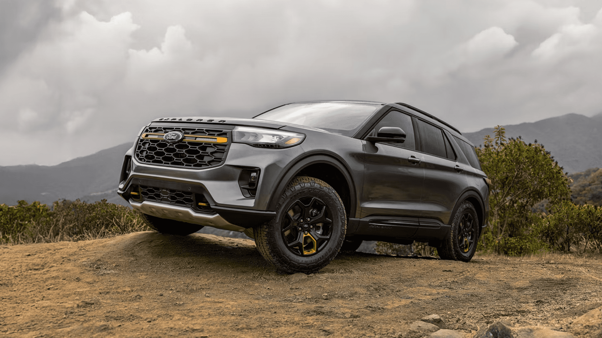 2026 Ford Explorer side profile with alloy wheels, showing SUV stance and overall exterior proportions.