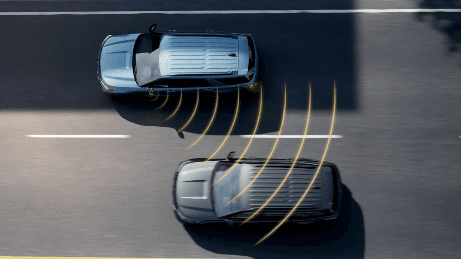 Overhead view of two vehicles with radar waves, illustrating Explorer driver assist detection and warning system