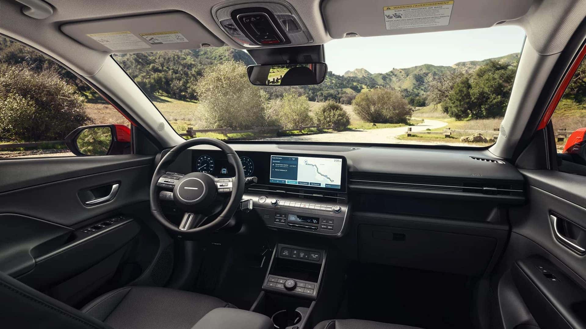 Wide dashboard view in the 2026 Hyundai Kona showing digital gauge cluster, infotainment screen, and center control panel