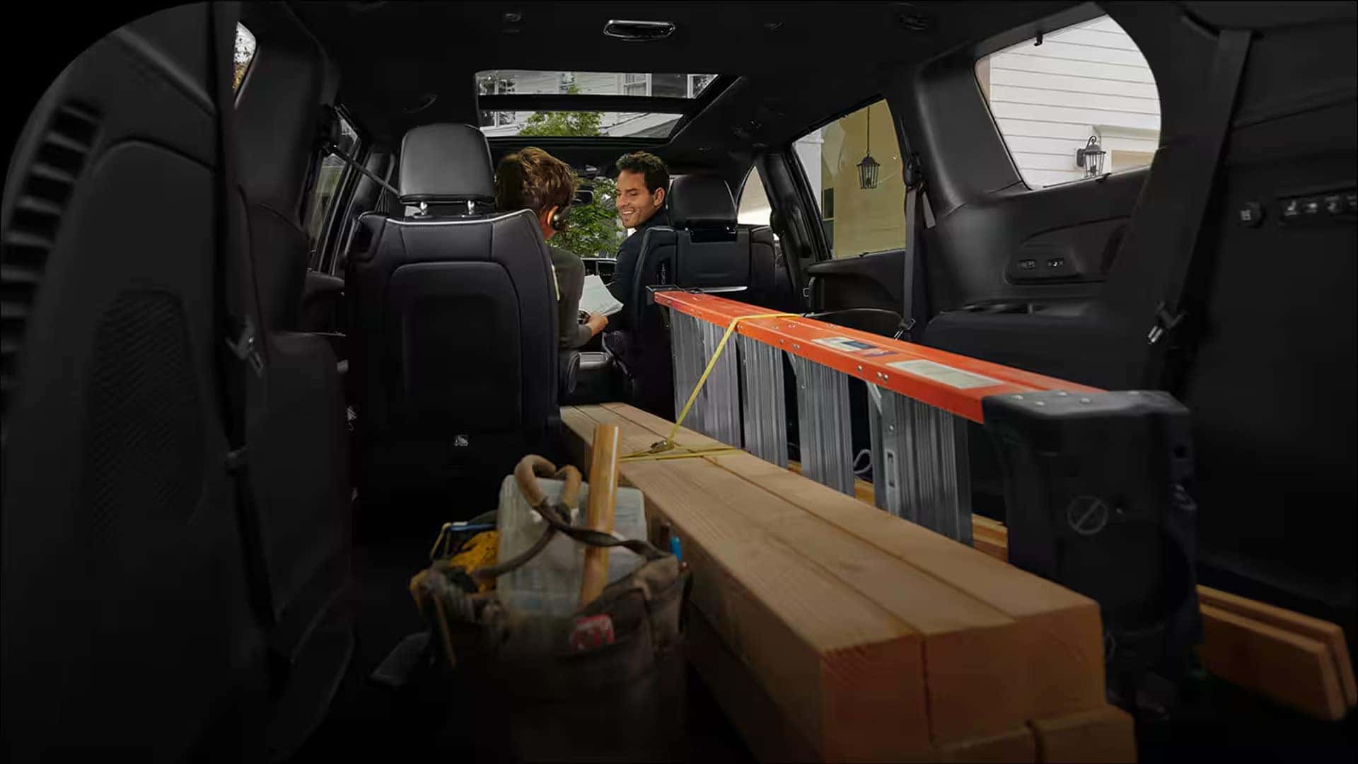 2026 Chrysler Pacifica cargo area with seats folded flat using the Stow ’n Go seating system for maximum storage space