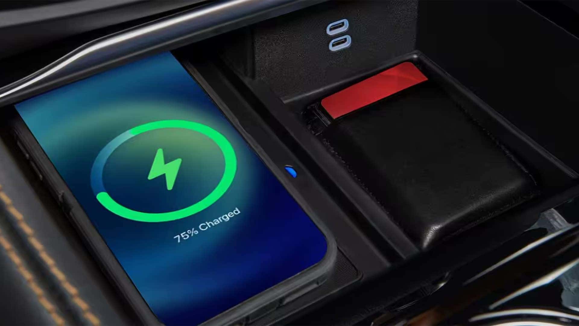 Wireless smartphone charging pad and USB-C ports inside the 2026 Chrysler Pacifica center console
