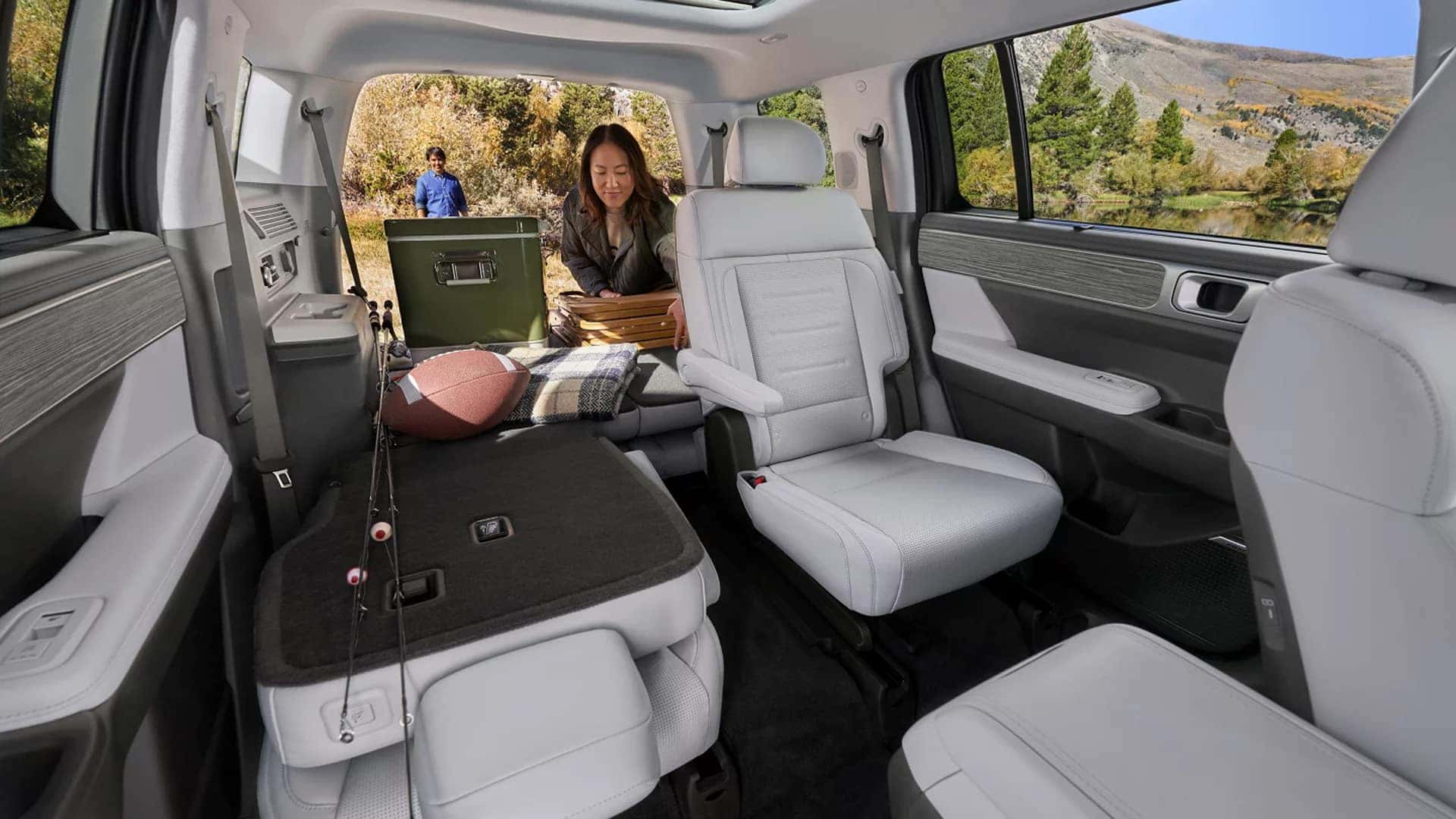 Rear seating and cargo area of the 2026 Hyundai Santa Fe with fold down seats creating a flexible storage layout