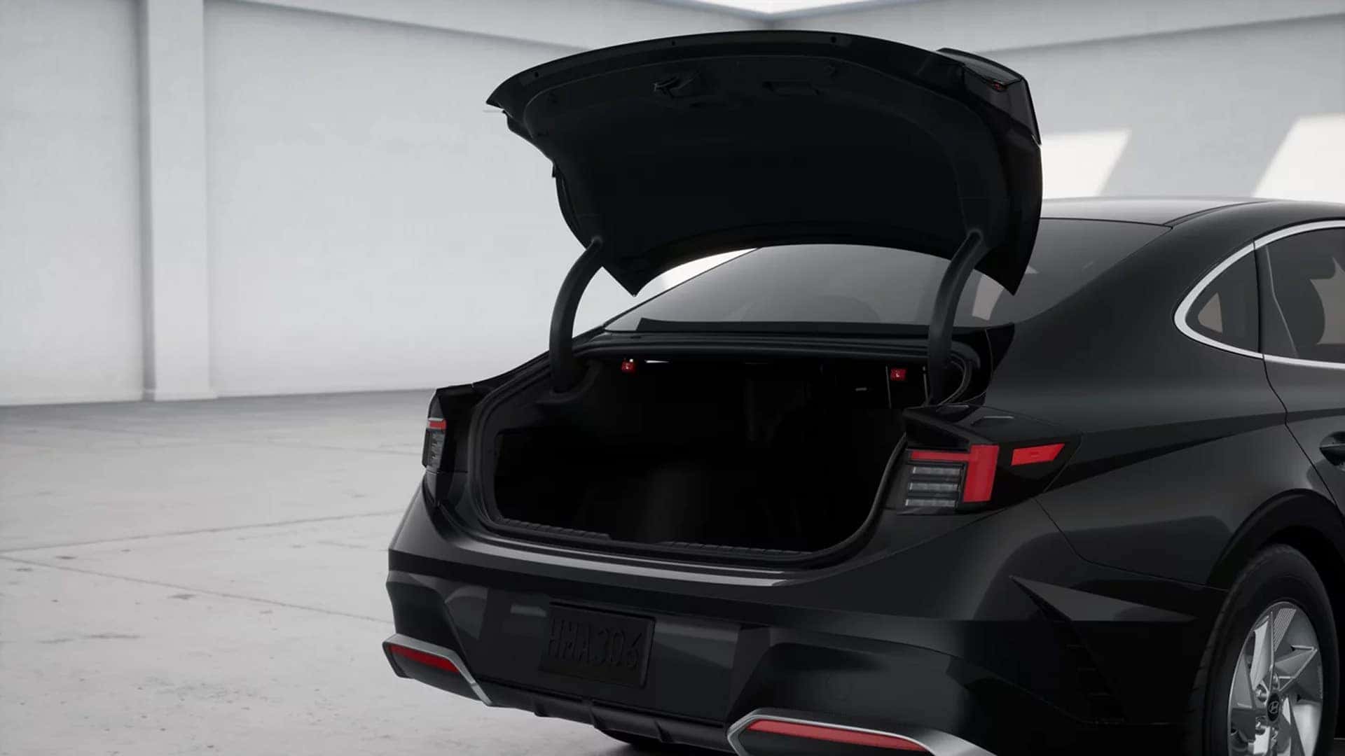 Open trunk of the 2026 Hyundai Sonata displaying cargo space and wide trunk opening for luggage and everyday storage.
