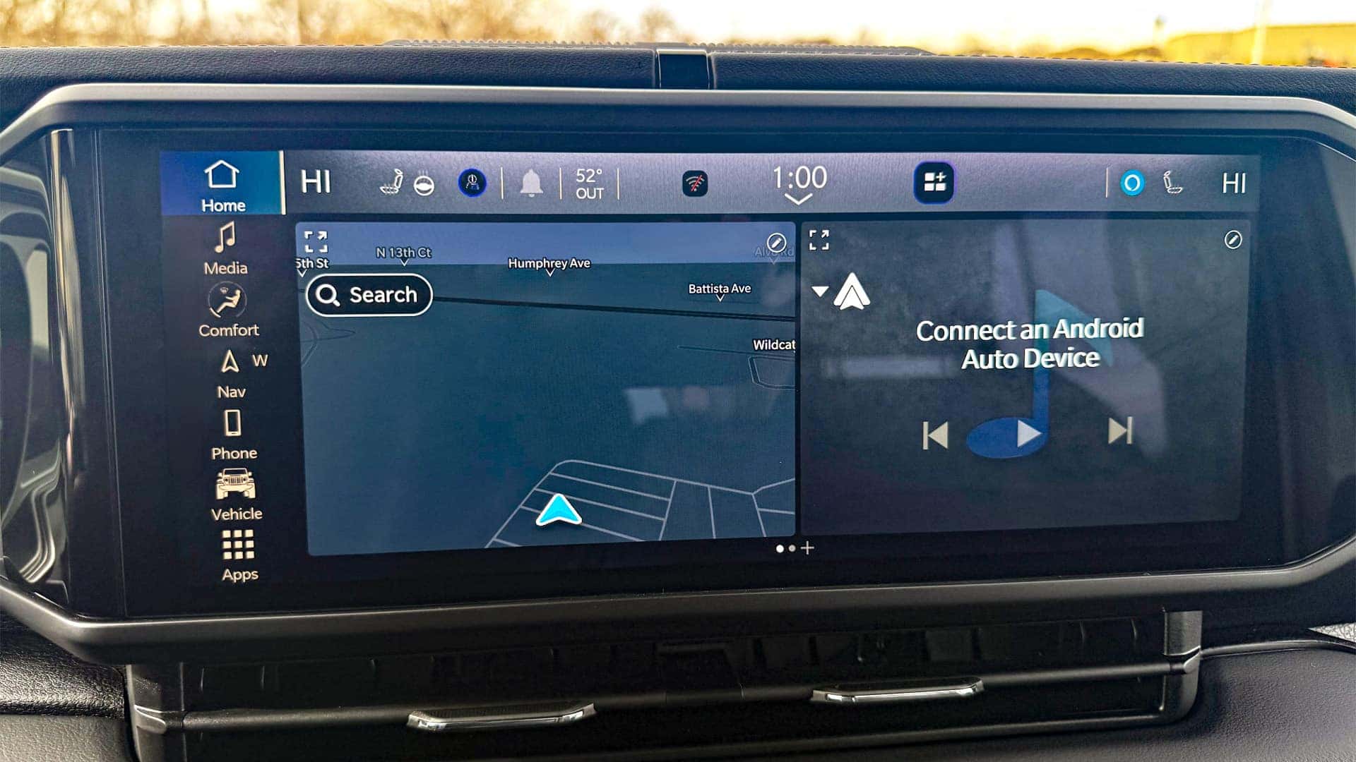 2026 Jeep Wrangler Uconnect display showing connected services interface with navigation search and Android Auto device pairing