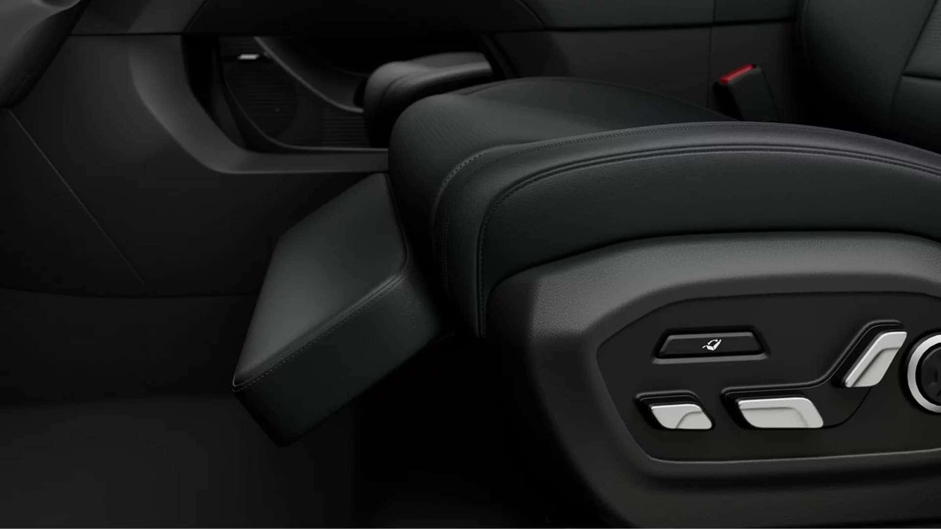 Close up of the 2026 Hyundai Santa Fe front seat showing premium upholstery, power seat controls, and comfort focused interior design