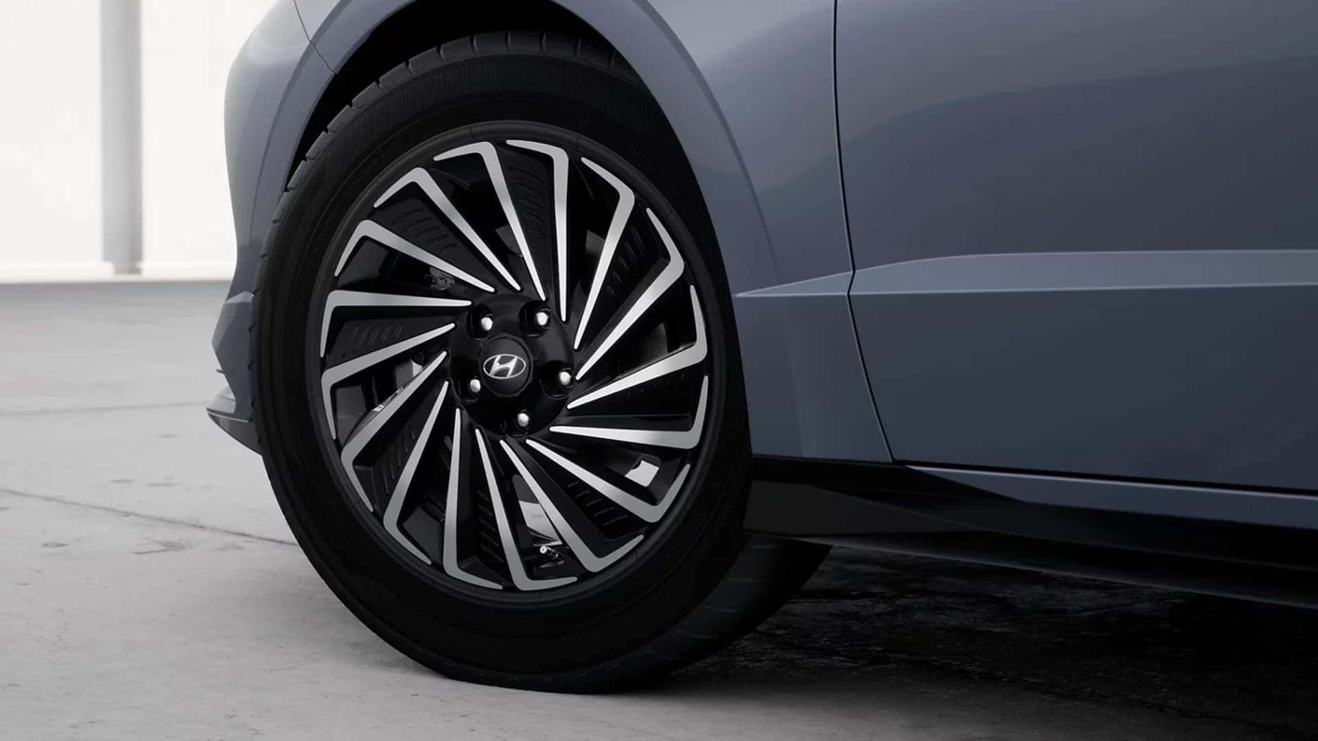 Close up of a 2026 Hyundai Sonata alloy wheel showing wheel design, tire profile, and lower body styling