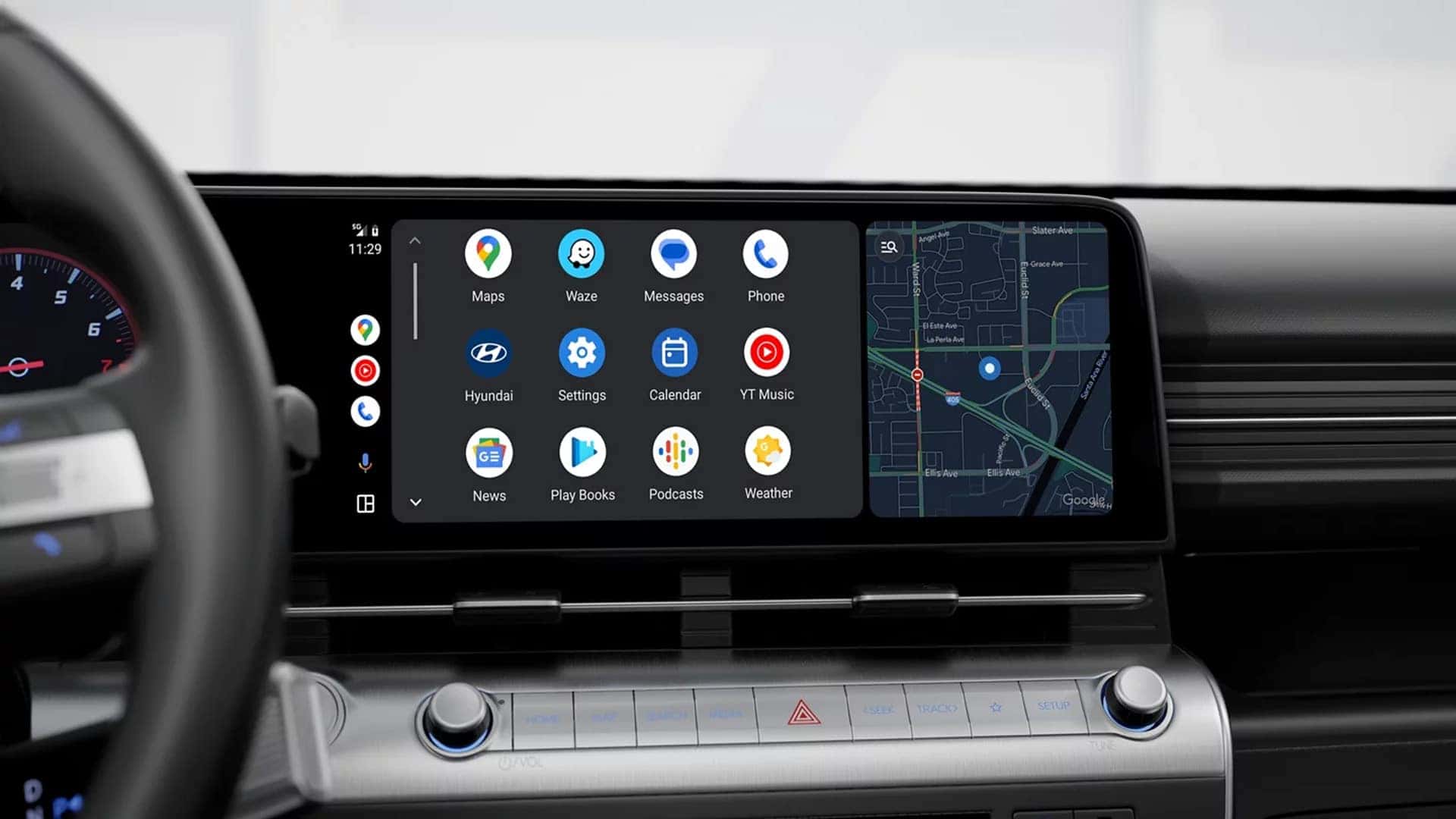 Wide dashboard perspective of the 2026 Hyundai Kona showing the digital gauge cluster and infotainment screen from the driver seat