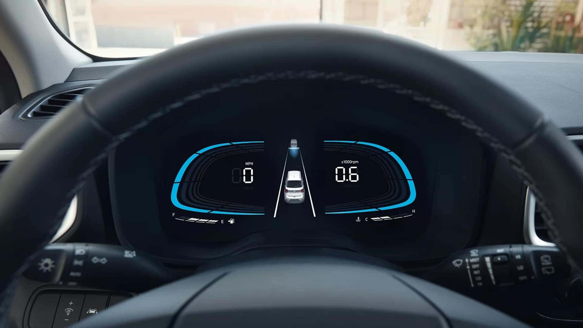Digital instrument cluster in the 2026 Hyundai Venue displaying speed, lane guidance, and driver assistance alerts.