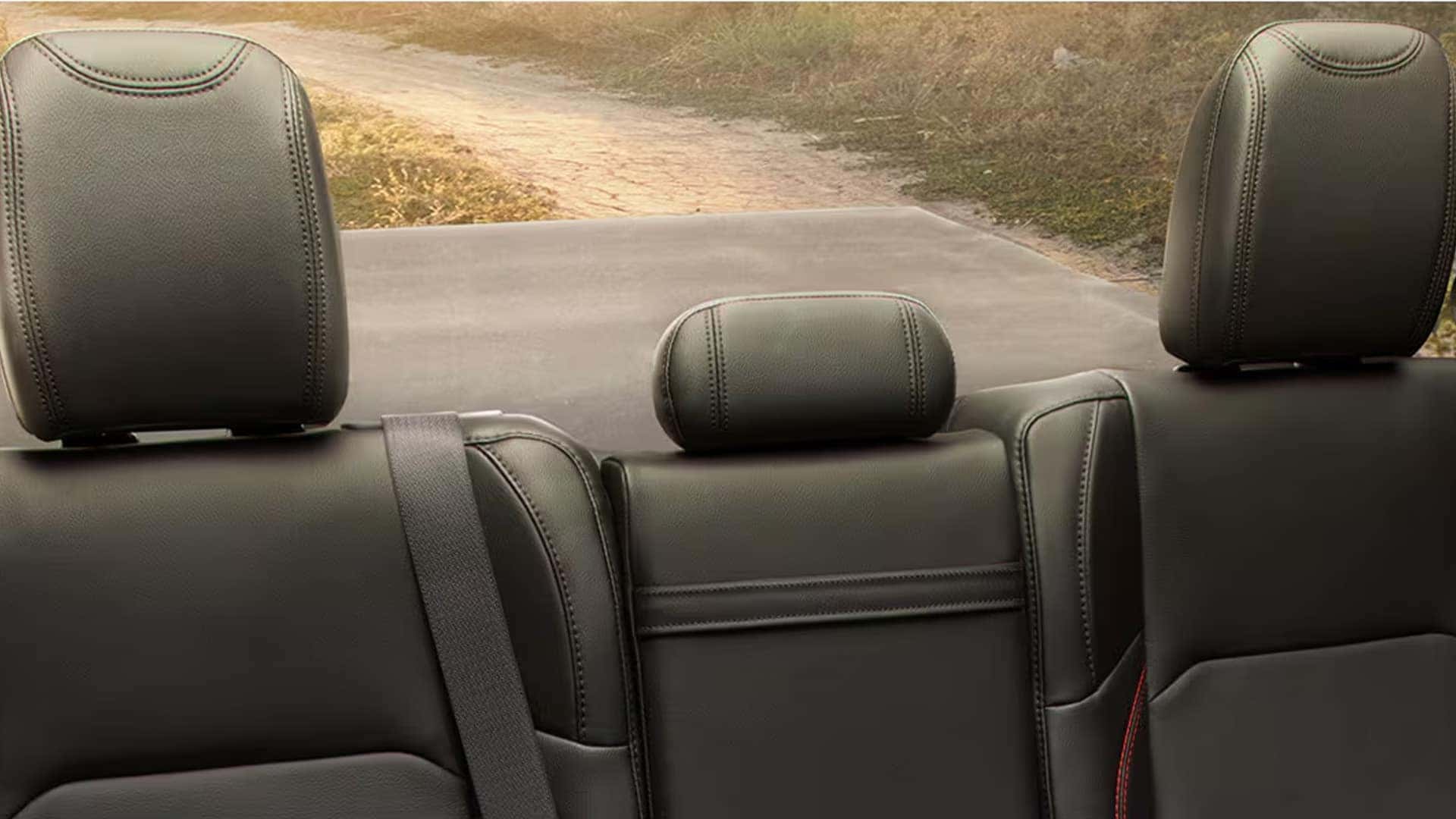 Rear seat headrests and upholstery stitching in the 2026 Jeep Gladiator interior with soft-touch materials