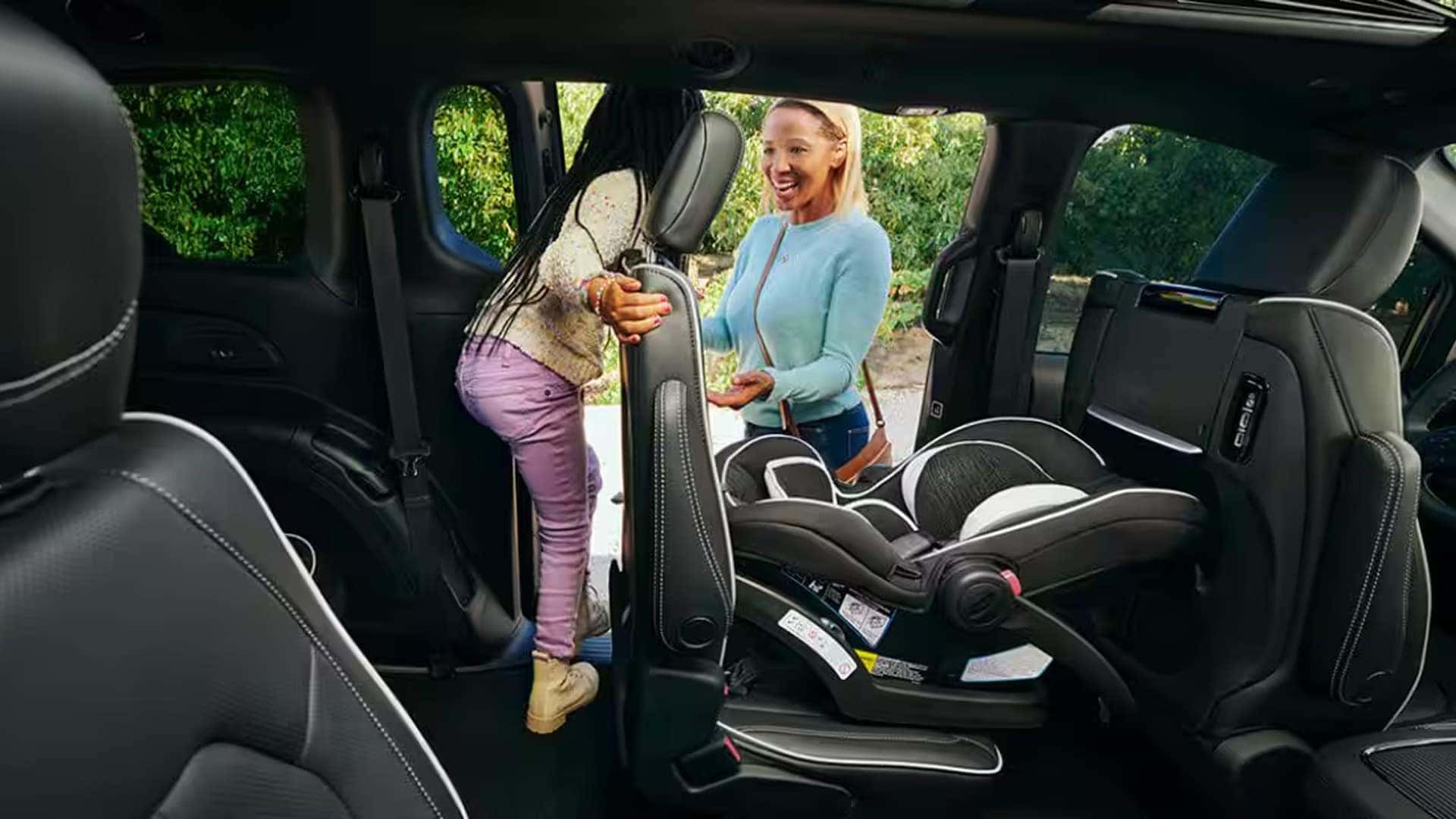 Second-row seat folding into the floor in the 2026 Chrysler Pacifica with the Stow ’n Go Seating and Storage System