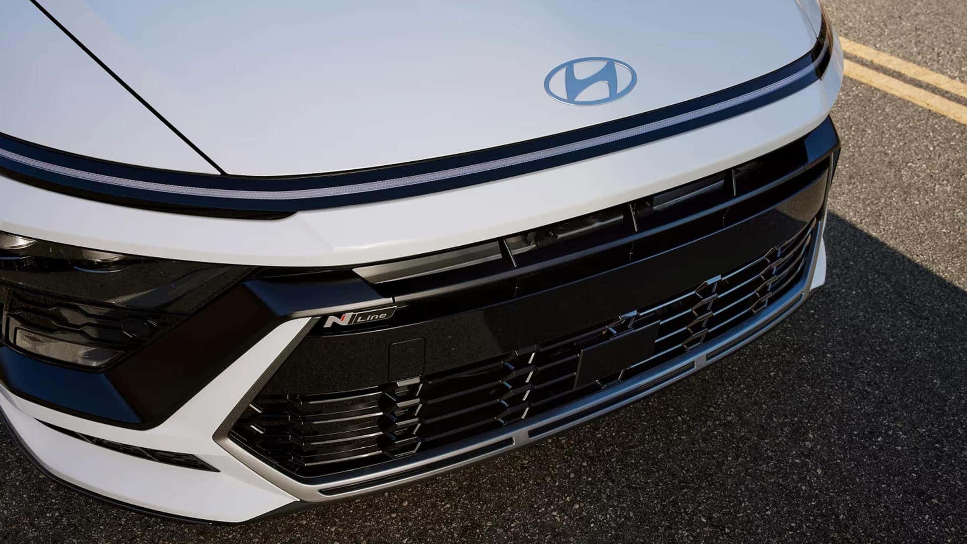 Close up of the 2026 Hyundai Sonata Hybrid front grille with N Line badge and lower air intake detailing.