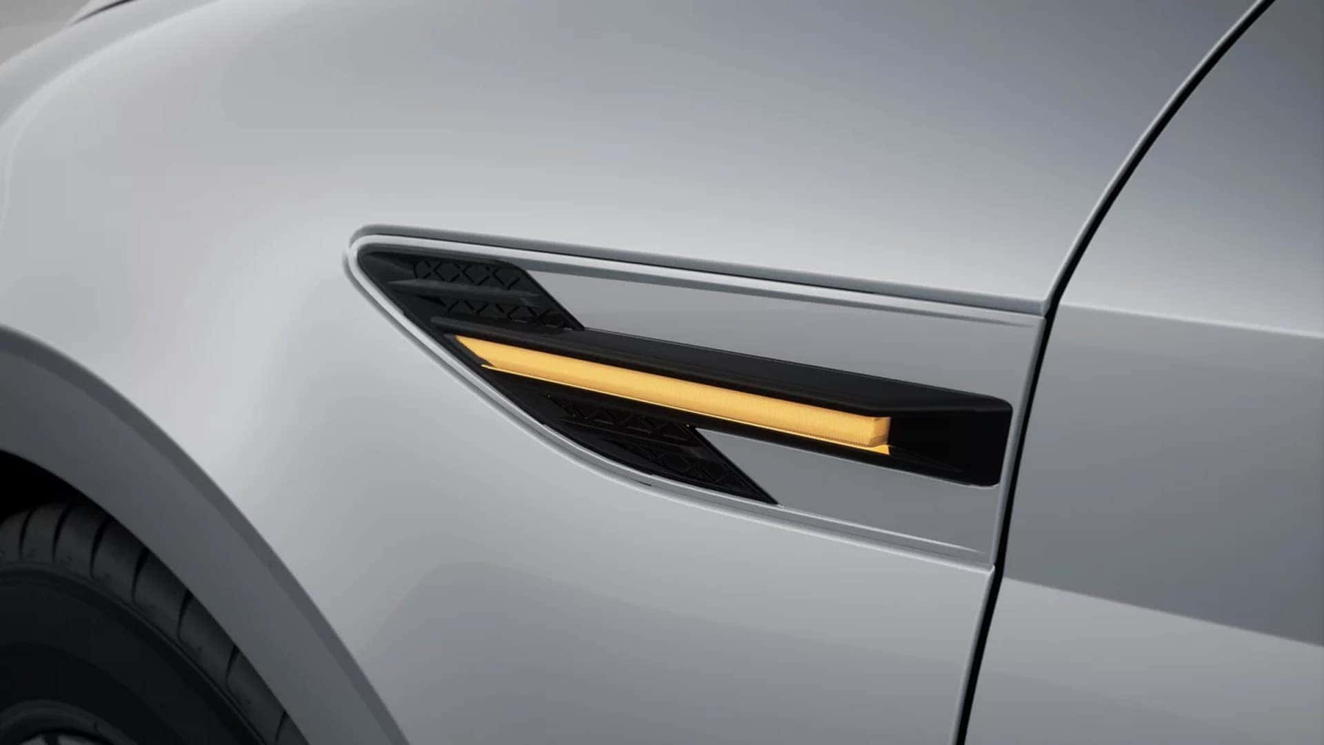 Side detail of the 2026 Hyundai Sonata Hybrid highlighting LED lighting accents and aerodynamic body sculpting