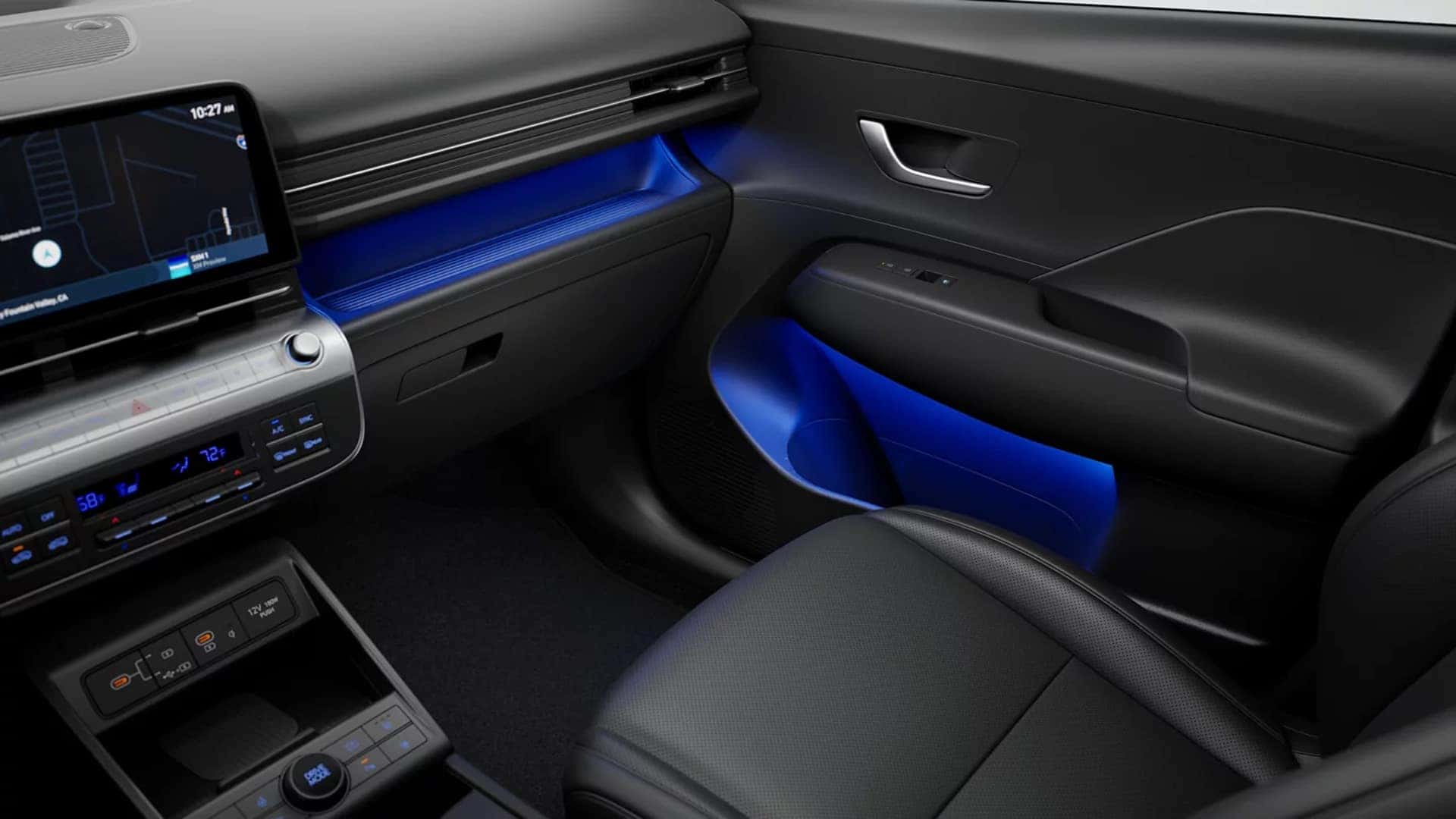 Interior view of the 2026 Hyundai Kona showing ambient lighting accents, center console controls, and front passenger seat