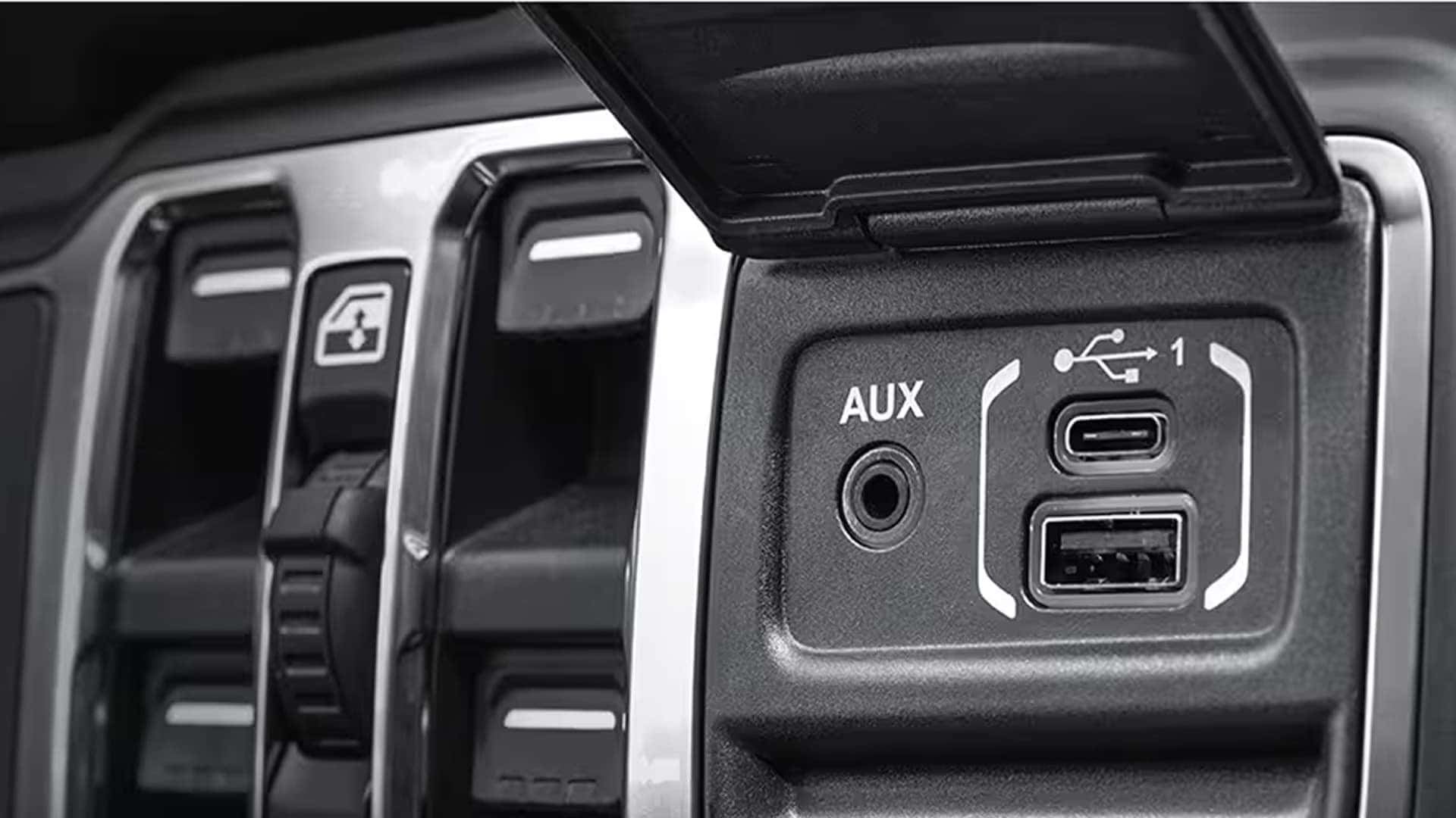 2026 Jeep Gladiator interior media ports with AUX, USB-C, and USB-A inputs on the center dashboard panel