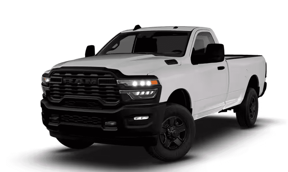 2026 RAM 3500 Tradesman regular cab truck in white, front three quarter view