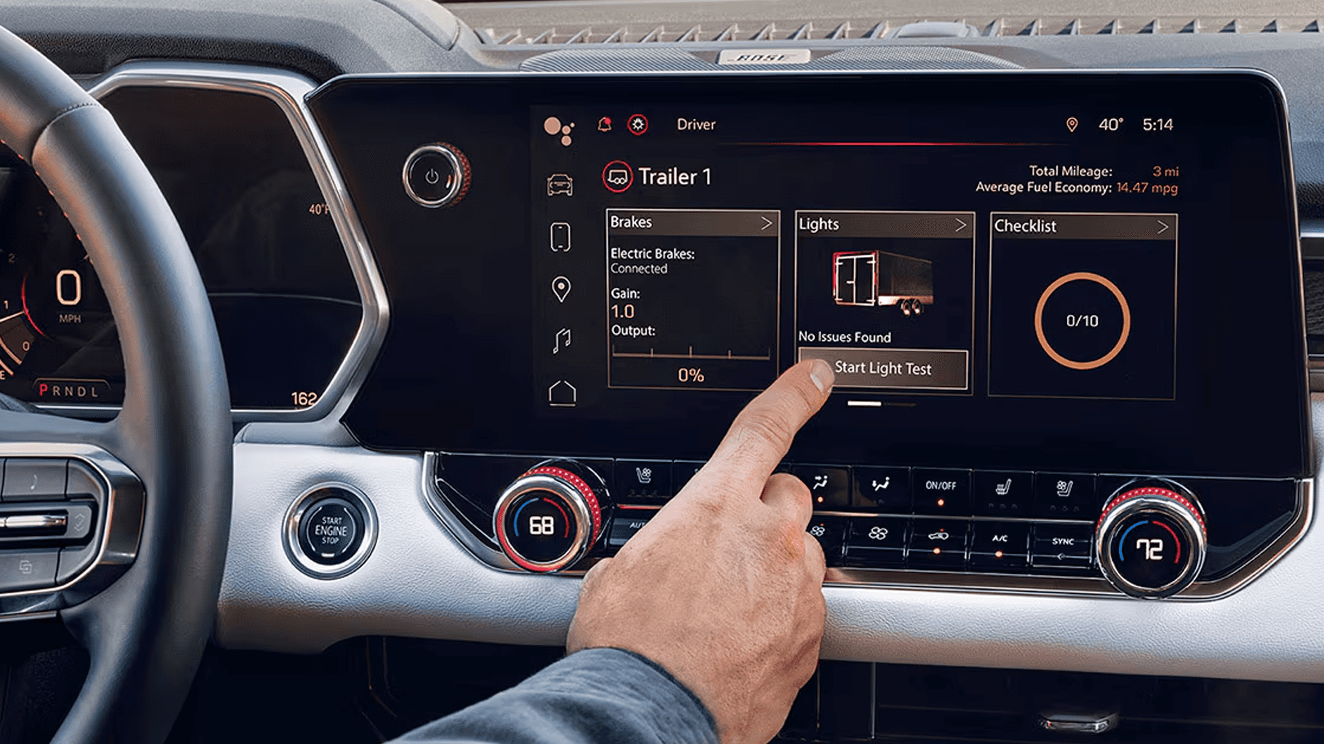 2026 GMC Canyon infotainment display showing ProGrade Trailering System controls and trailer status information