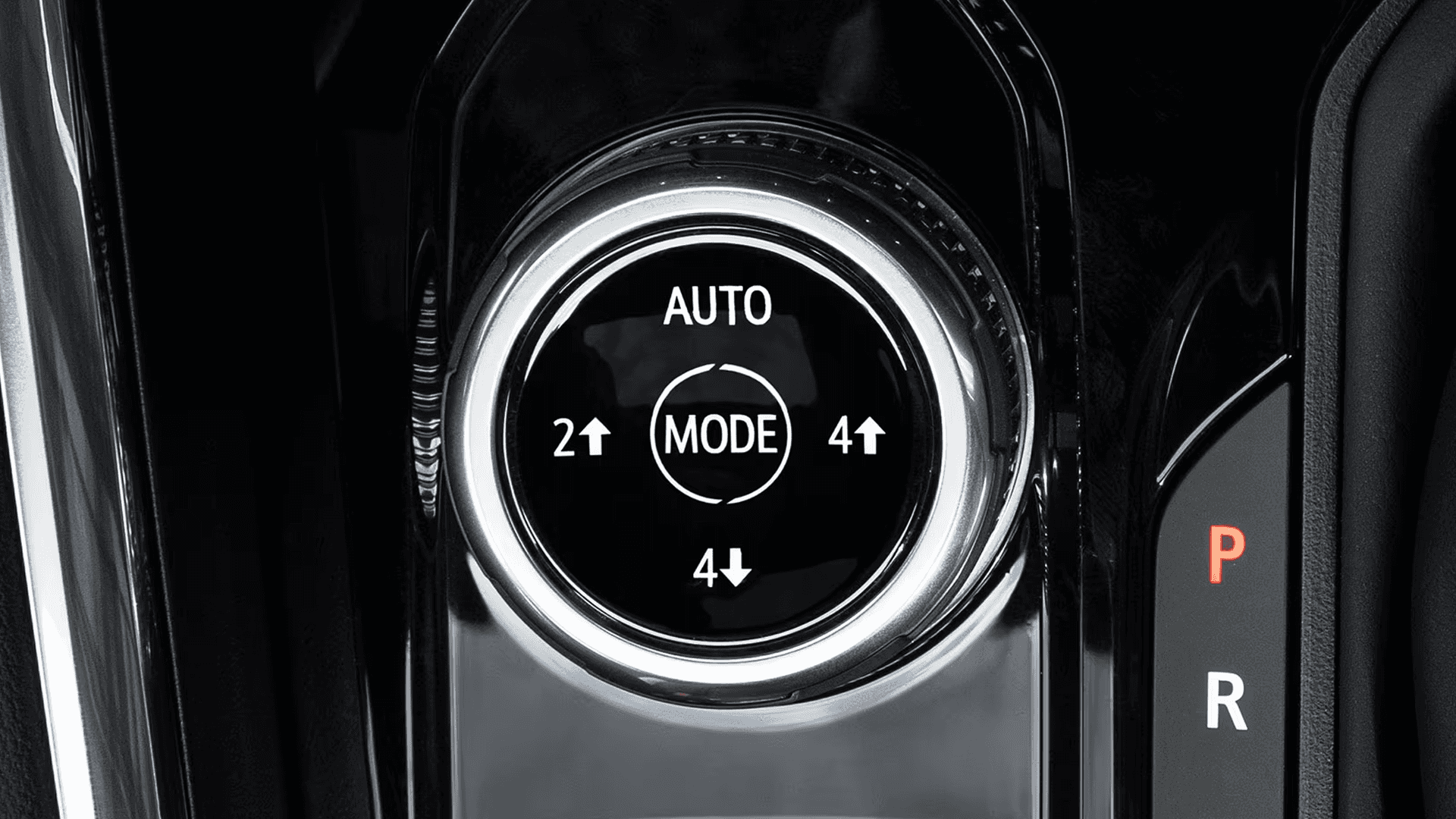 Drive mode selector dial inside the 2026 GMC Canyon showing Auto, 2WD, and 4WD settings used for changing terrain conditions