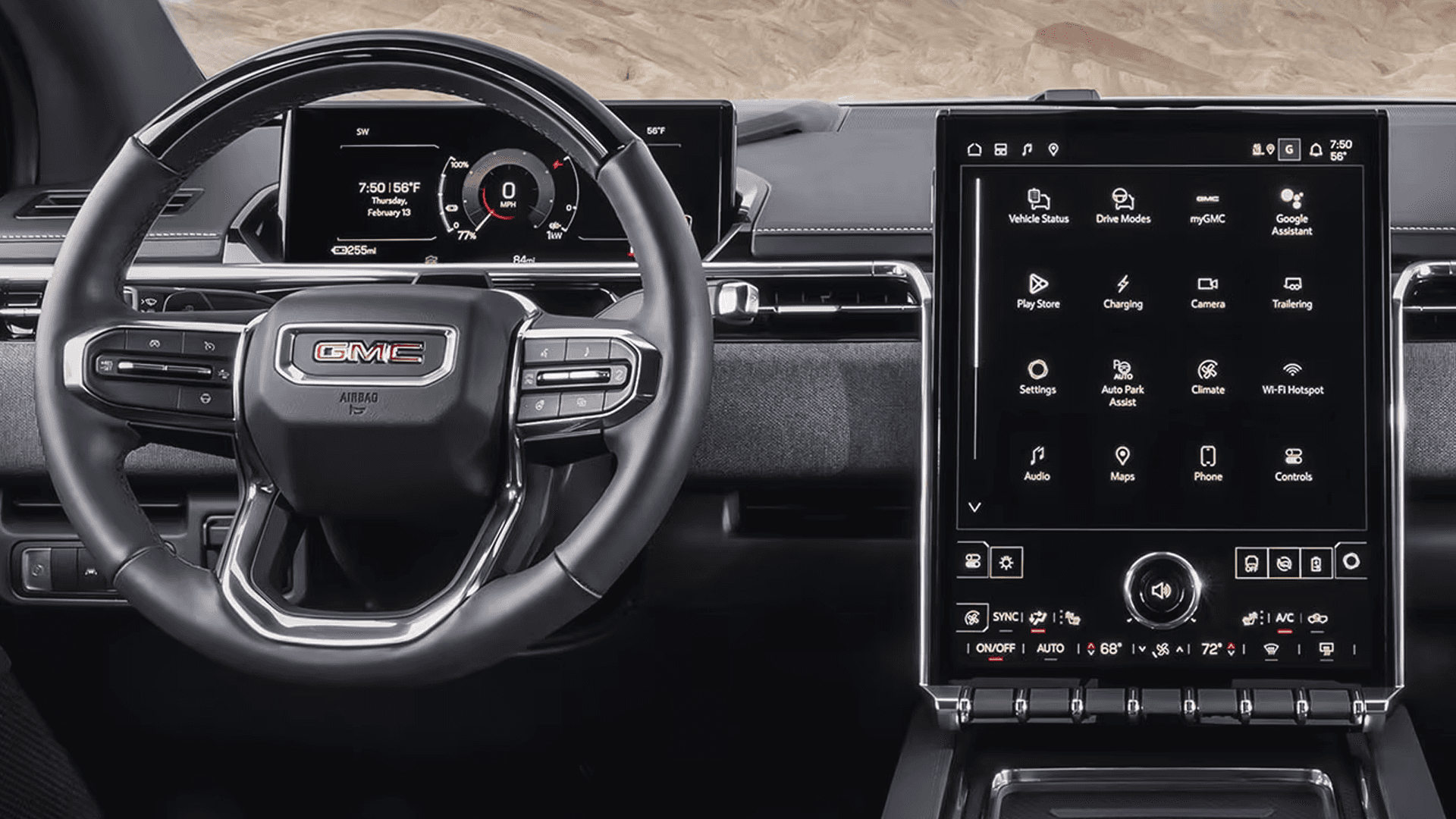 Straight-on view of GMC Sierra EV dashboard with steering wheel, driver display, and large center touchscreen