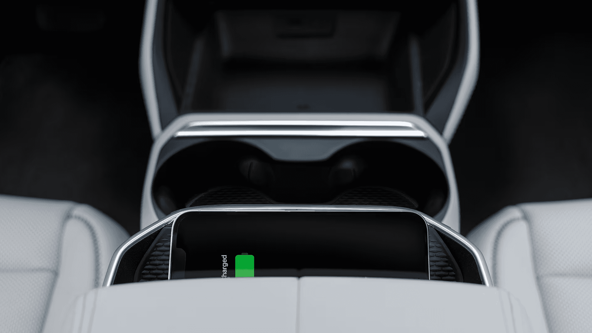 Wireless smartphone charging pad in the 2026 GMC Terrain center console with device charging indicator visible.