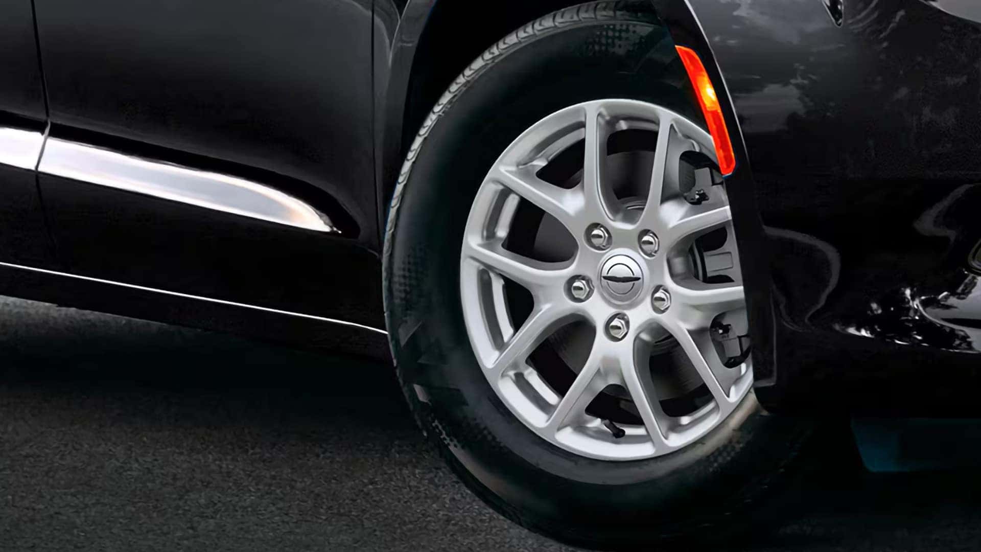 Close up of 17 inch aluminum wheel on a 2026 Chrysler Voyager showing multi spoke design and tire detail