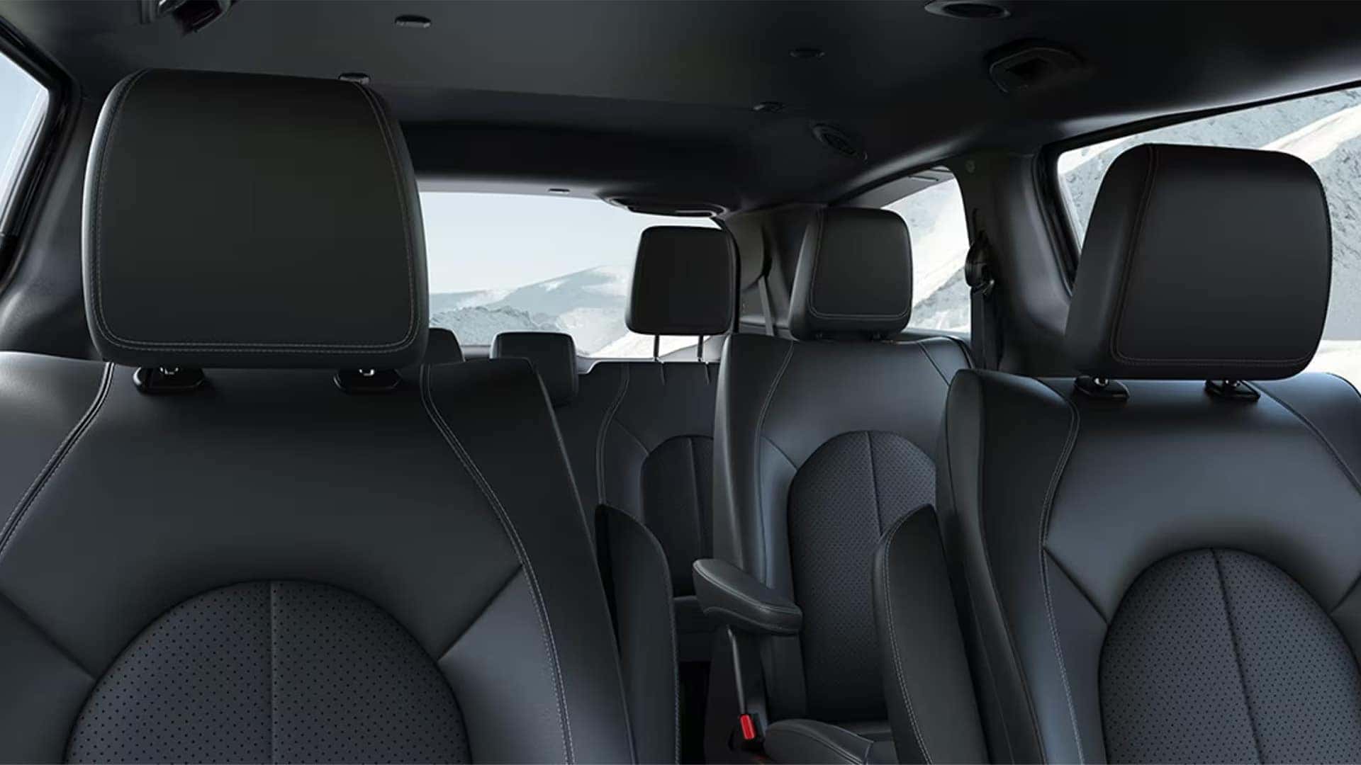 Interior view of the 2026 Chrysler Voyager showing front and second row seating with black upholstery