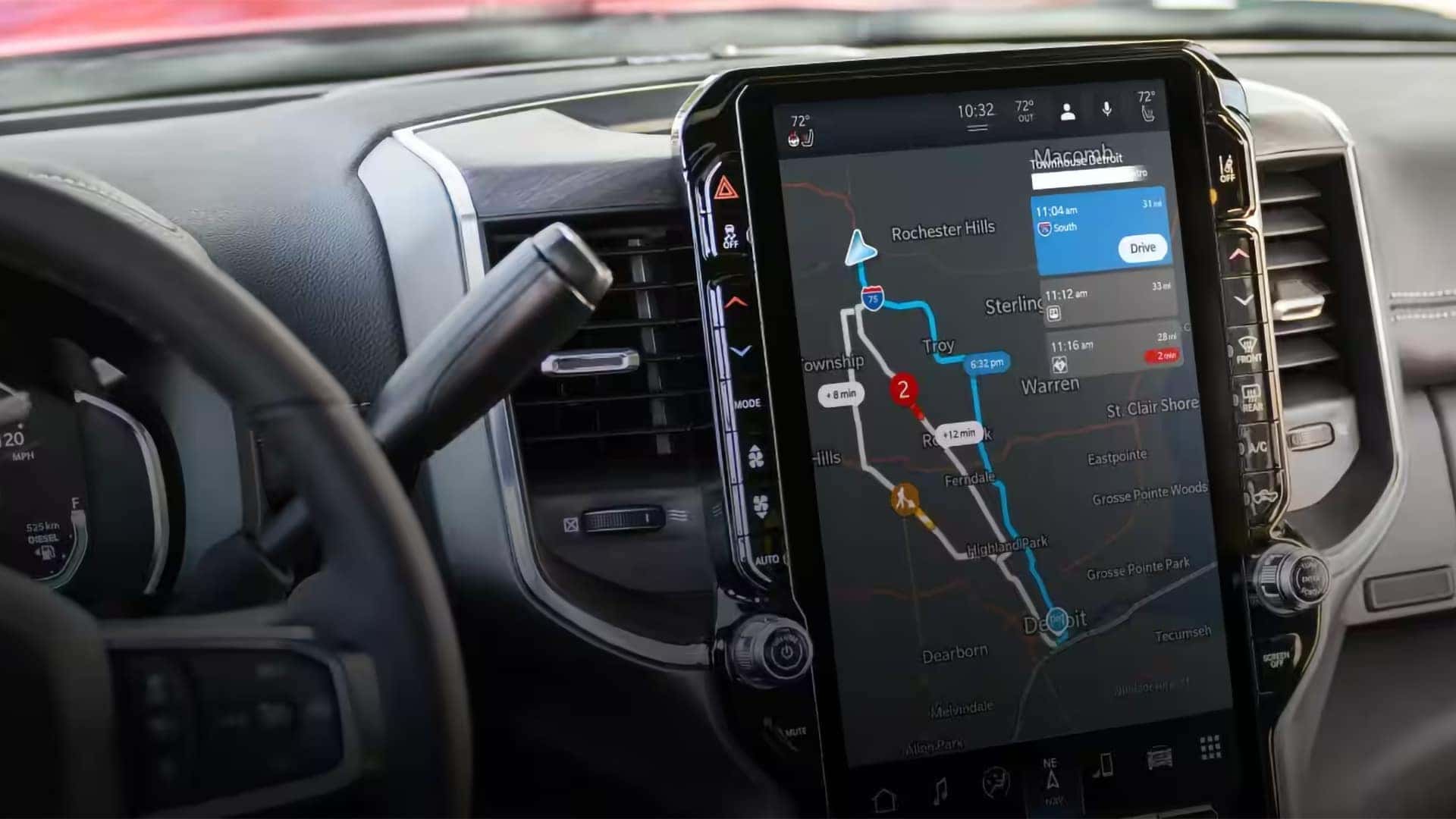 14.5-inch touchscreen infotainment display in the 2026 RAM 2500 interior showing navigation and Uconnect system interface