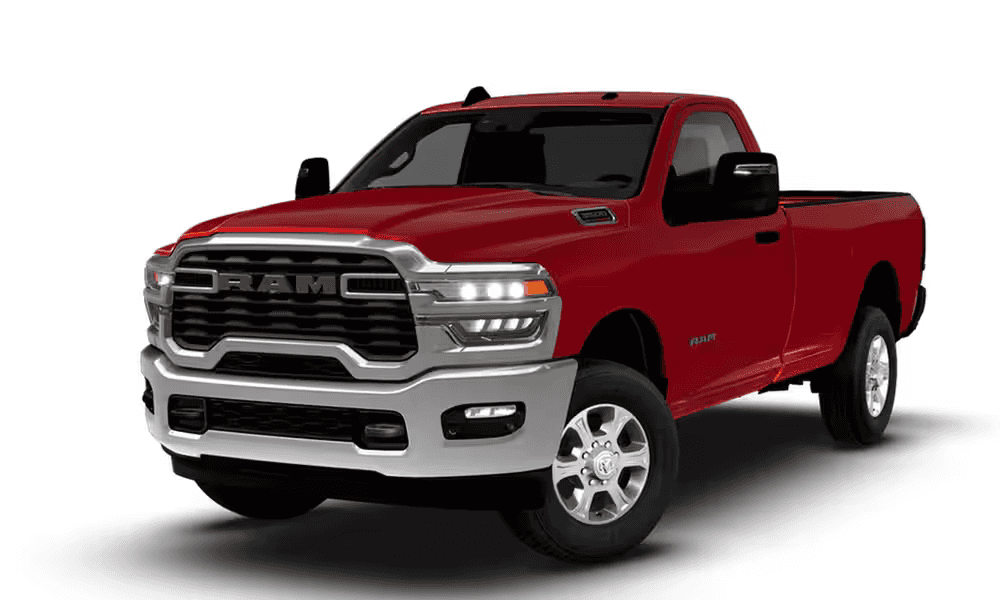 2026 RAM 3500 Big Horn regular cab truck in red, front three quarter view