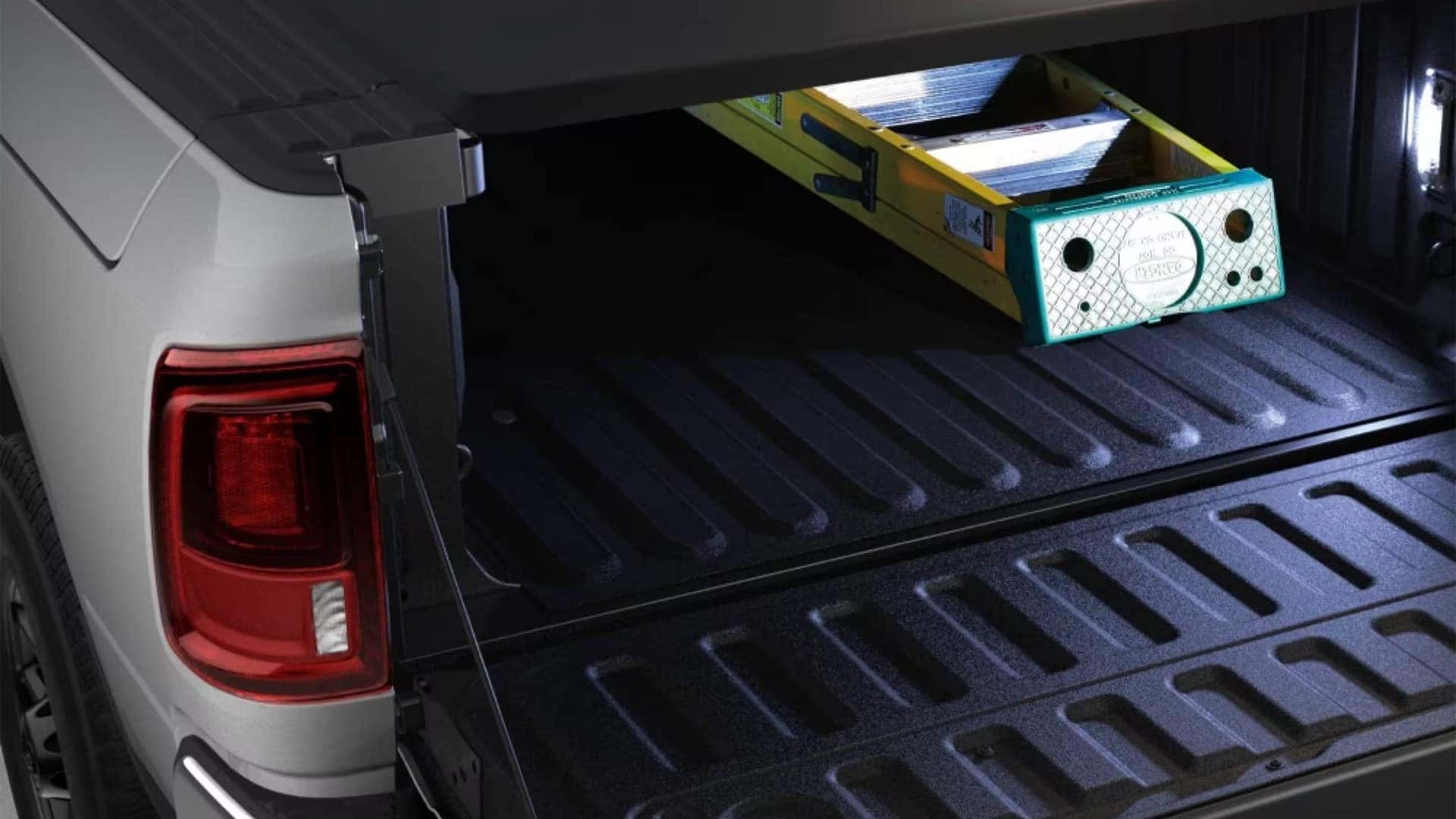 2026 Ram 3500 truck bed with LED bed lighting and cargo space for hauling tools and equipment