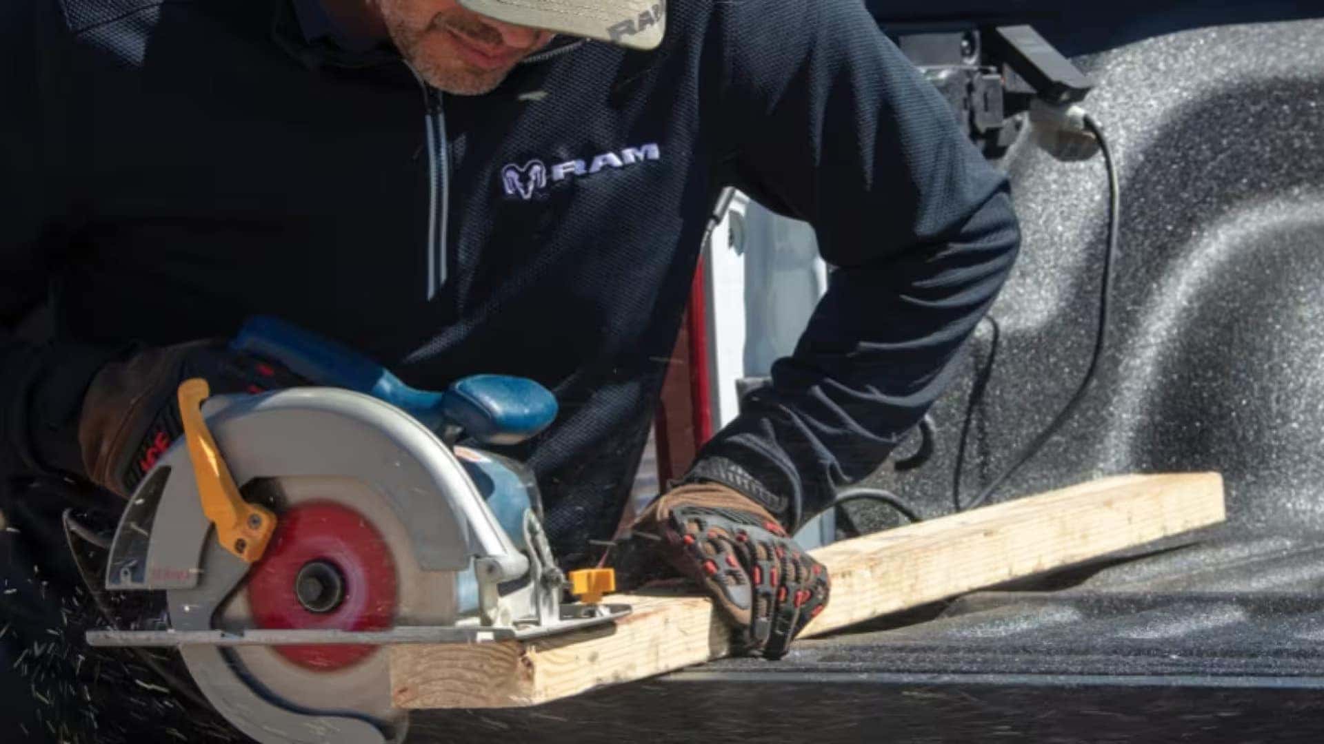 2026 Ram 3500 using available bed power outlet to operate a circular saw for jobsite work