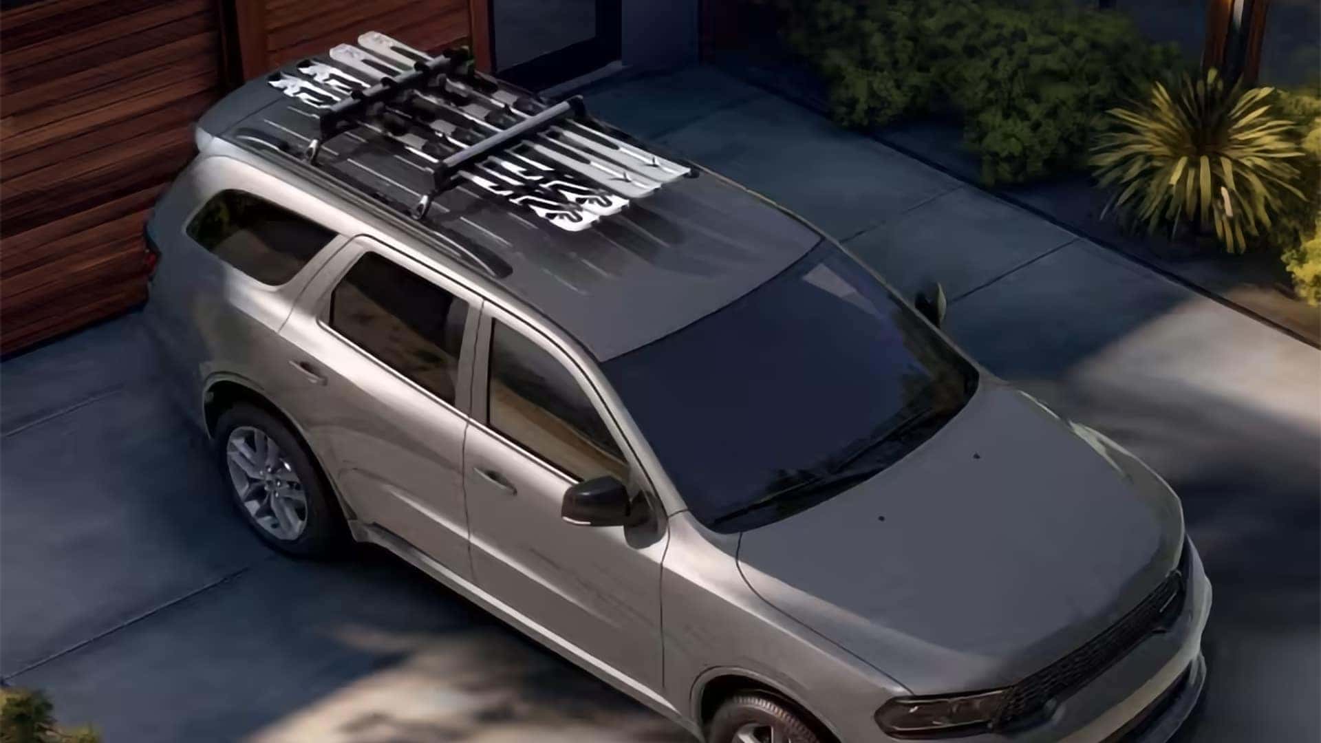 Top view of the 2026 Dodge Durango with roof rack system carrying skis, highlighting roof cargo capability