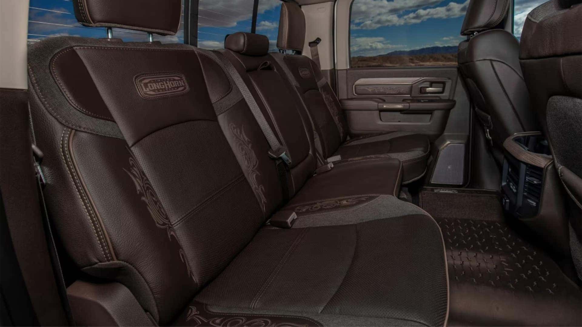 2026 RAM 3500 Limited Longhorn interior center console with premium leather and wood trim storage