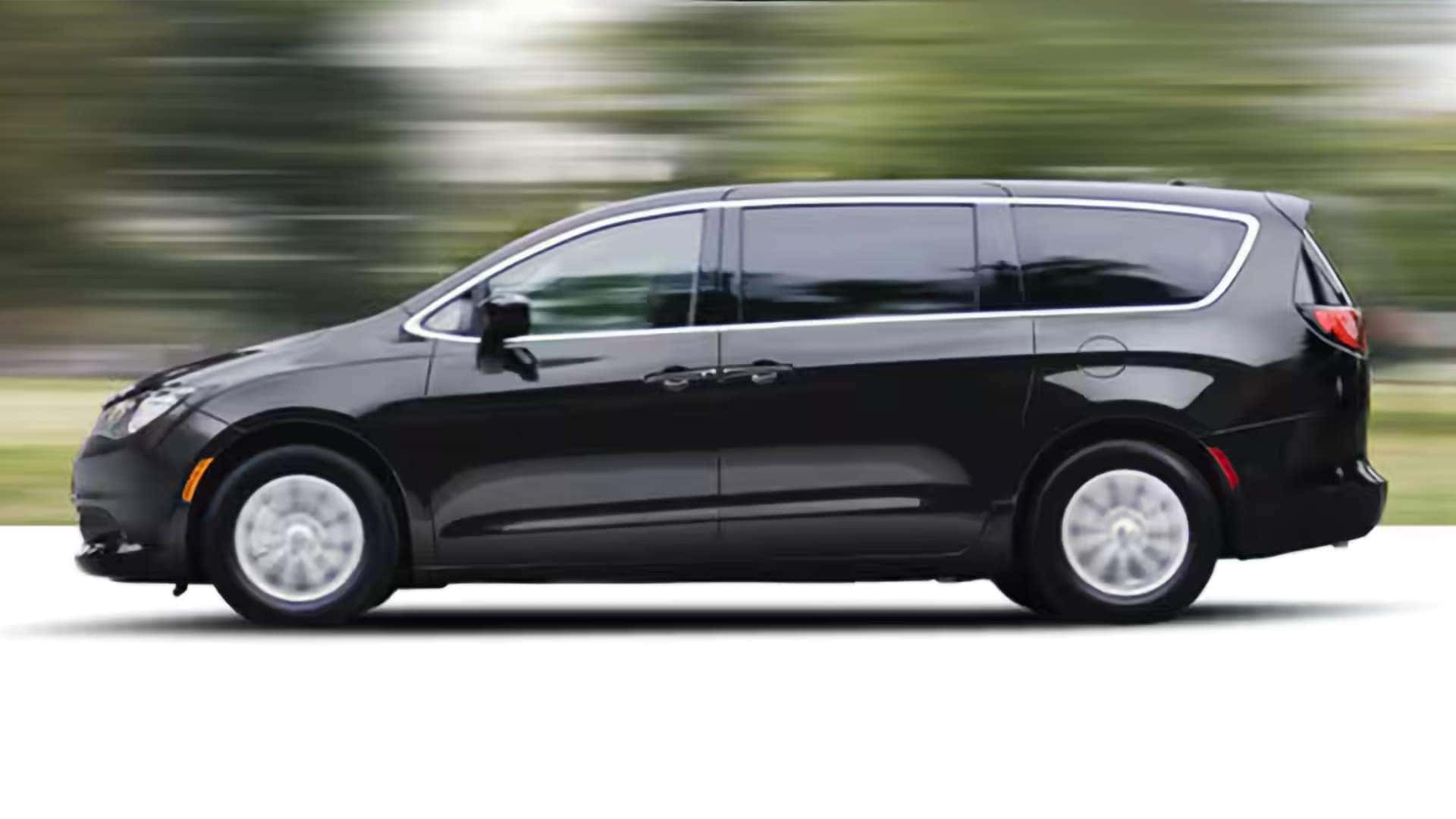 Side profile of the 2026 Chrysler Voyager in motion highlighting smooth ride and V6 performance
