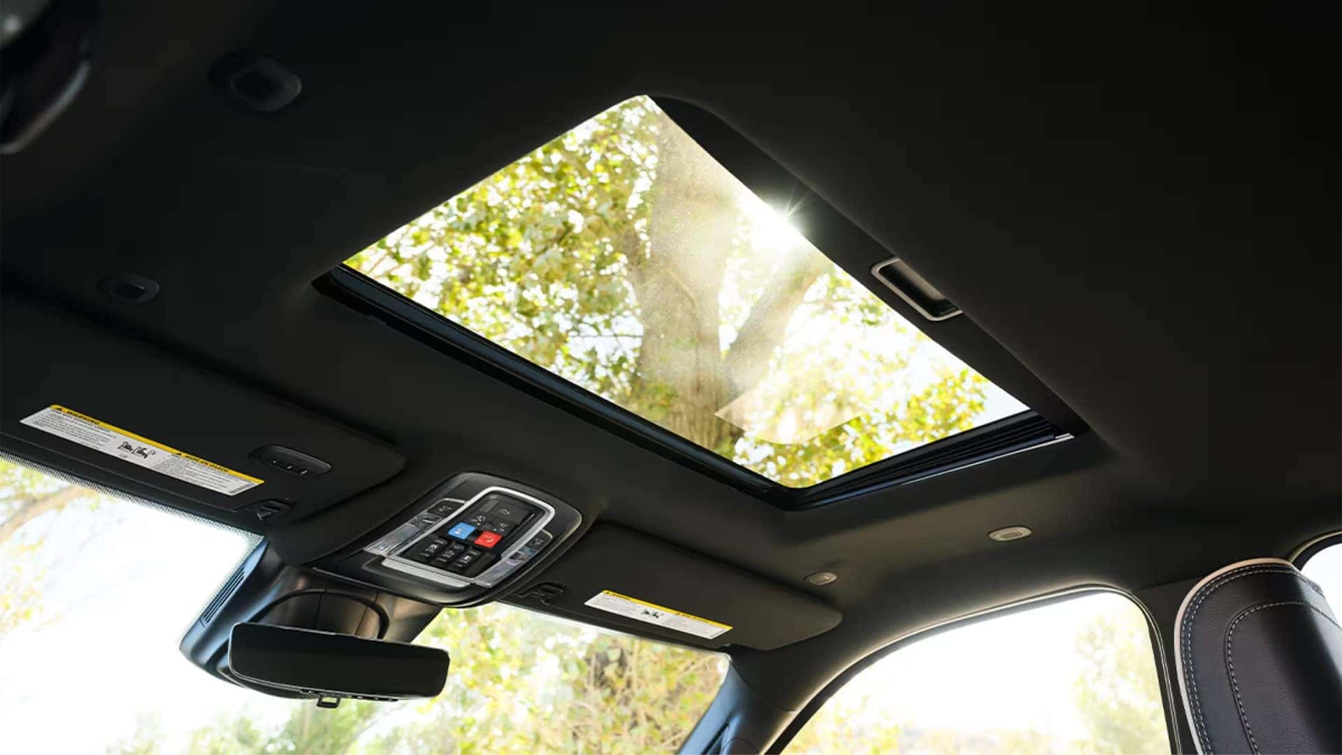 Sunroof and overhead controls in the 2026 RAM 2500 interior letting natural light into the cabin